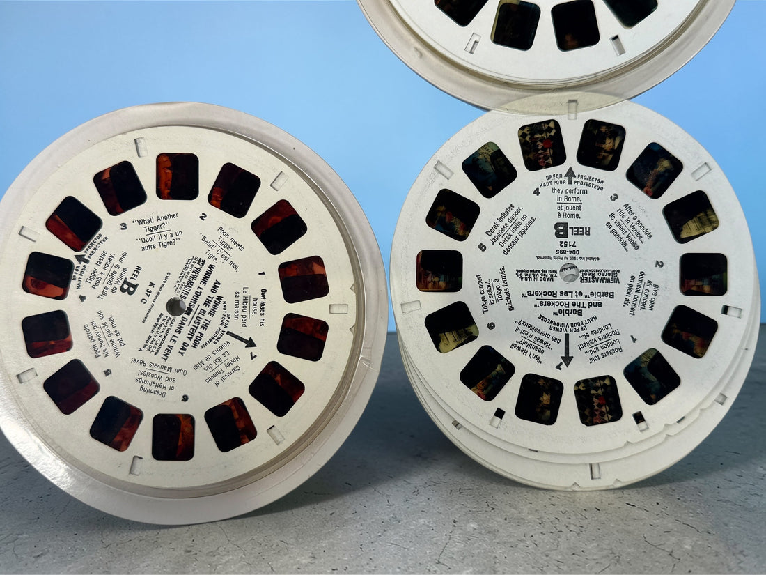 Vintage 1970s GAF View-Master Disney Gift Pak with viewer and reels. Classic 3D toy set with original canister, great collectible condition.
