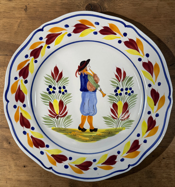 Henriot Quimper hand-painted faience plate with Breton musician motif, vintage French pottery collectible in excellent condition, ideal wall decor.