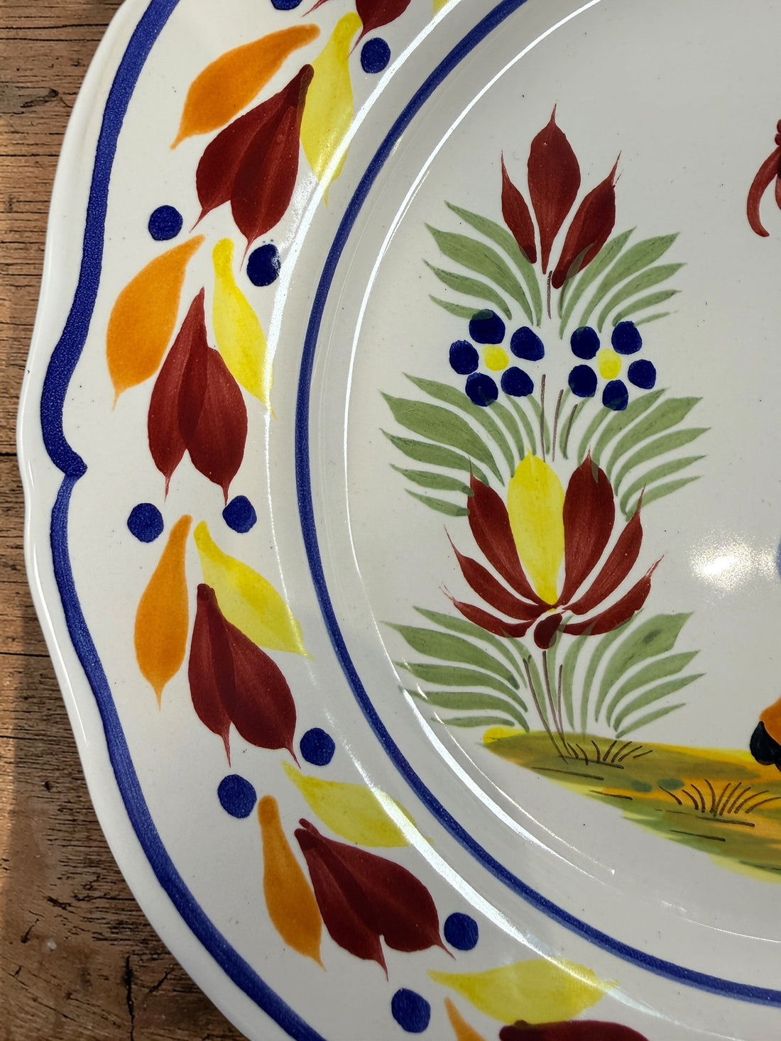 Henriot Quimper hand-painted faience plate with Breton musician motif, vintage French pottery collectible in excellent condition, ideal wall decor.