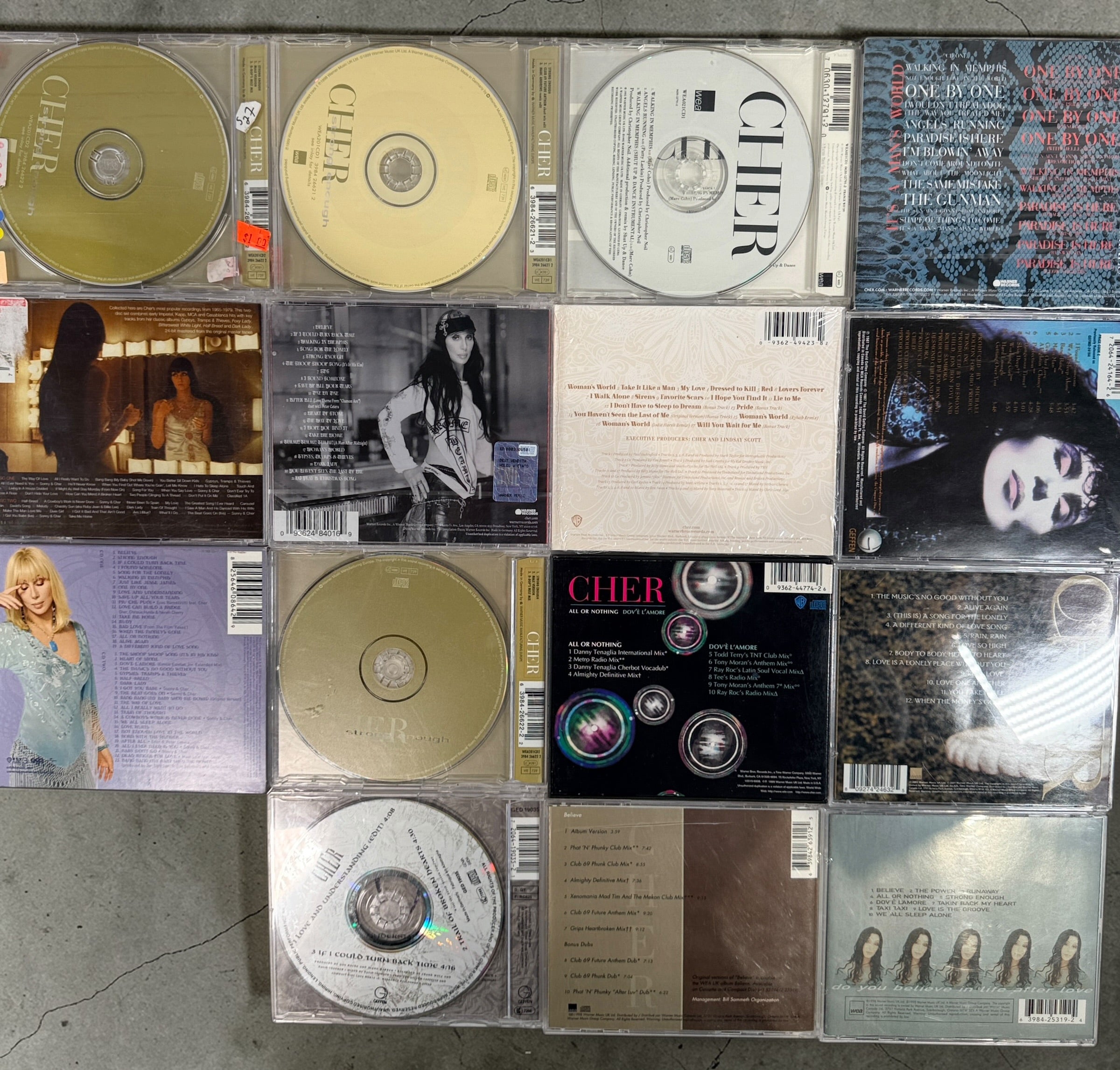 Cher CD lot of 10 albums and singles including Believe and Living Proof. Great starter collection with classic hits. Good condition with light wear.