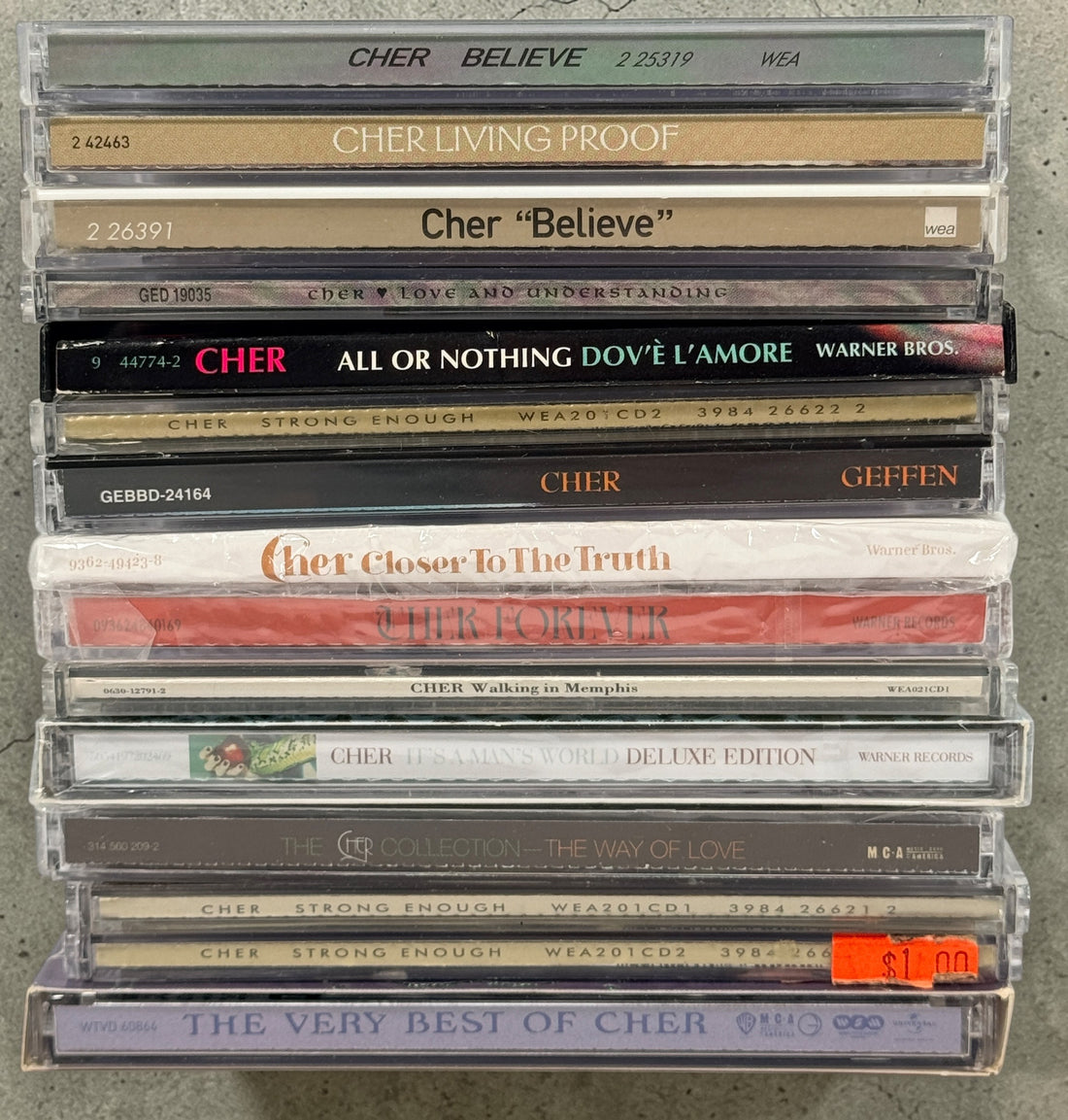 Cher CD lot of 10 albums and singles including Believe and Living Proof. Great starter collection with classic hits. Good condition with light wear.