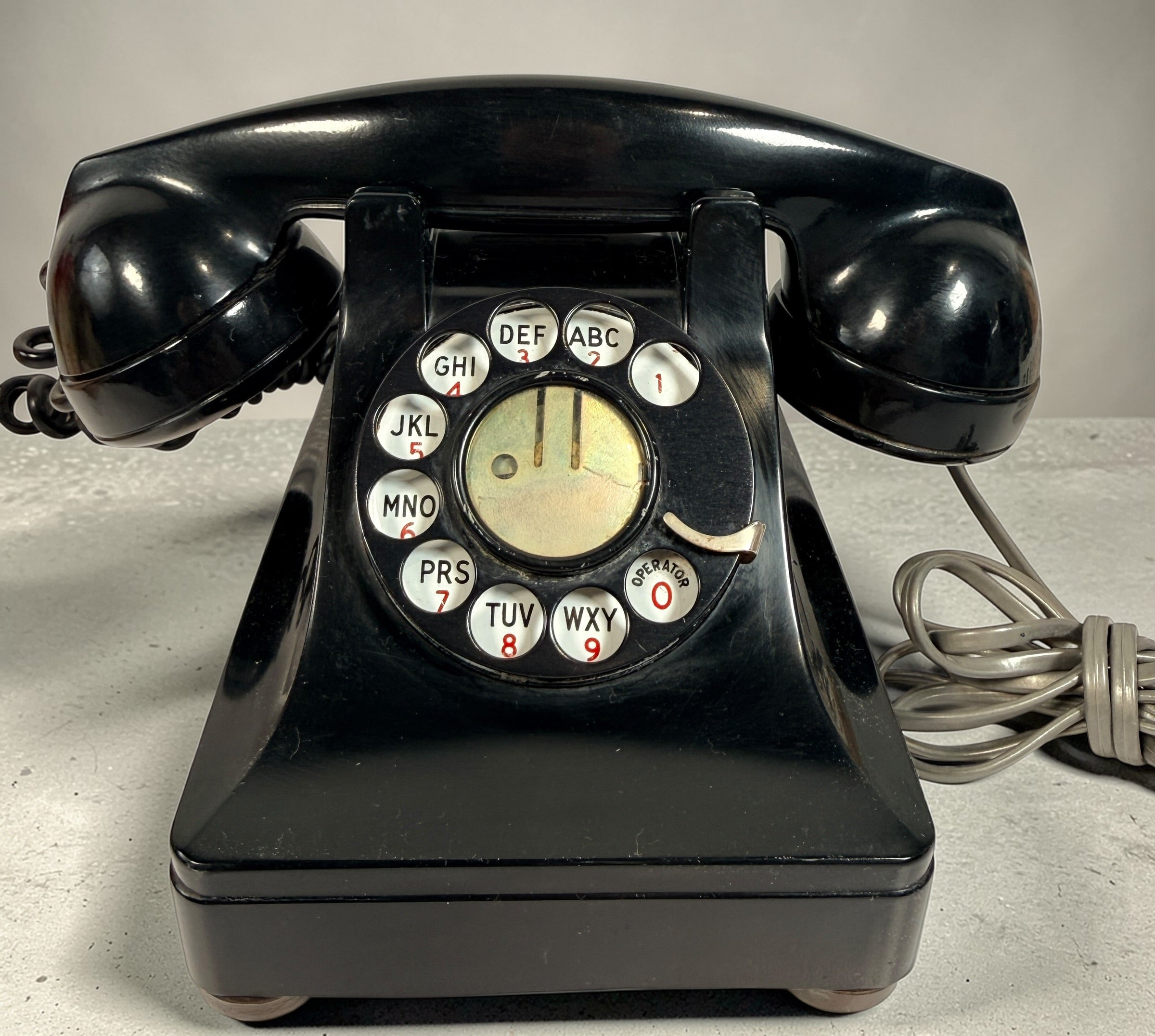 Vintage Northern Electric rotary telephone in black Bakelite, classic Canadian mid-century design. Great display piece or restoration project.