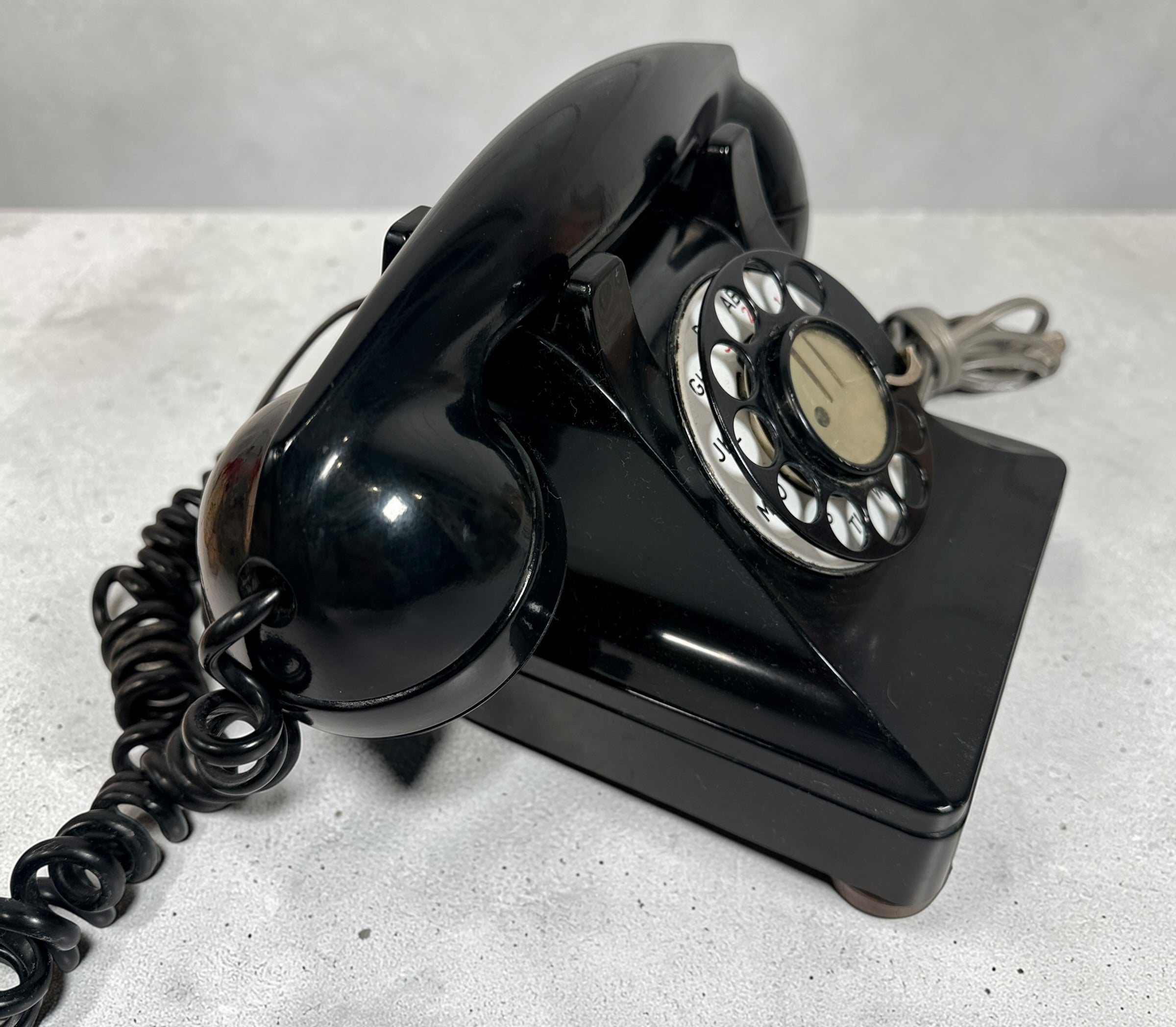 Vintage Northern Electric rotary telephone in black Bakelite, classic Canadian mid-century design. Great display piece or restoration project.