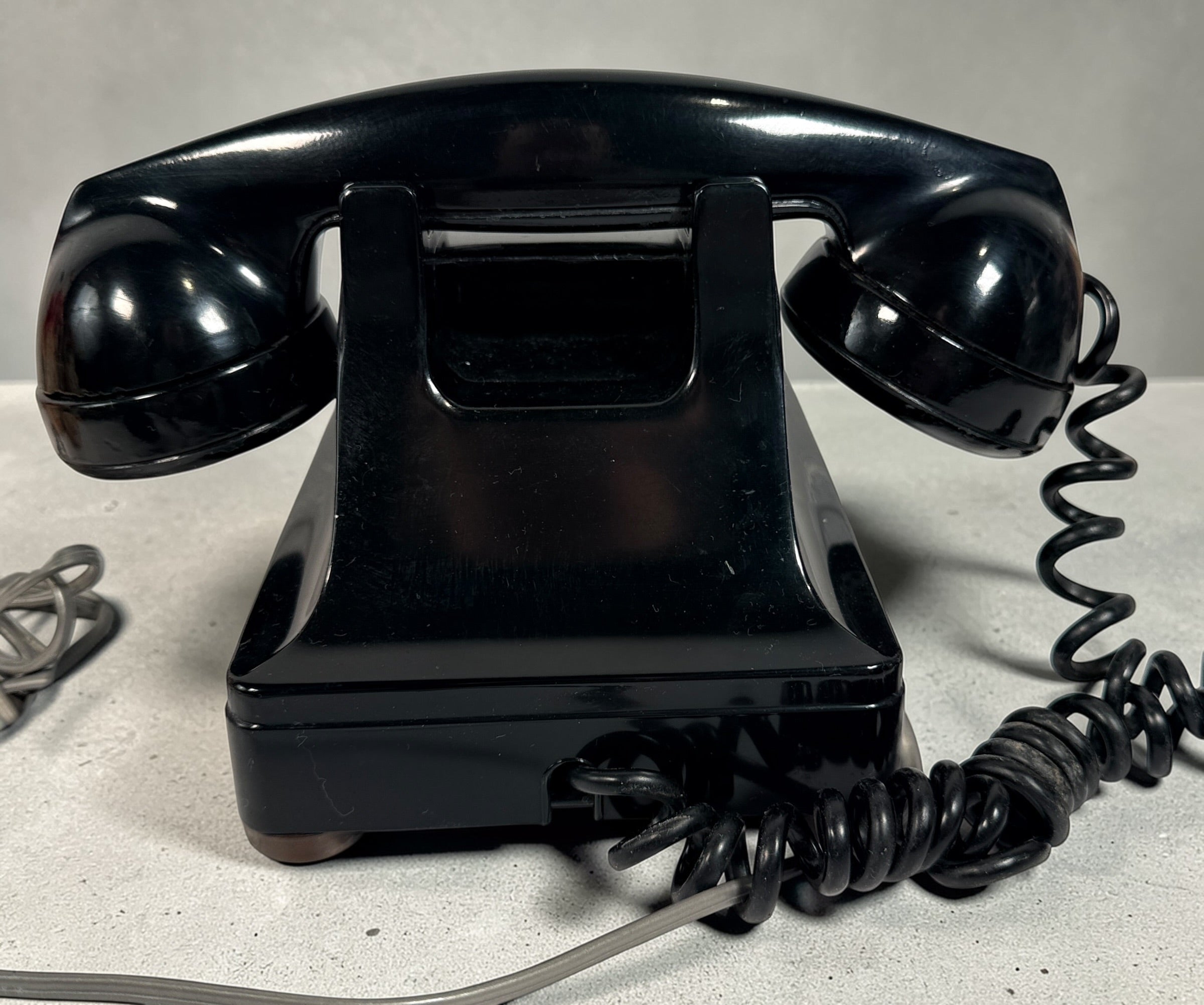 Vintage Northern Electric rotary telephone in black Bakelite, classic Canadian mid-century design. Great display piece or restoration project.