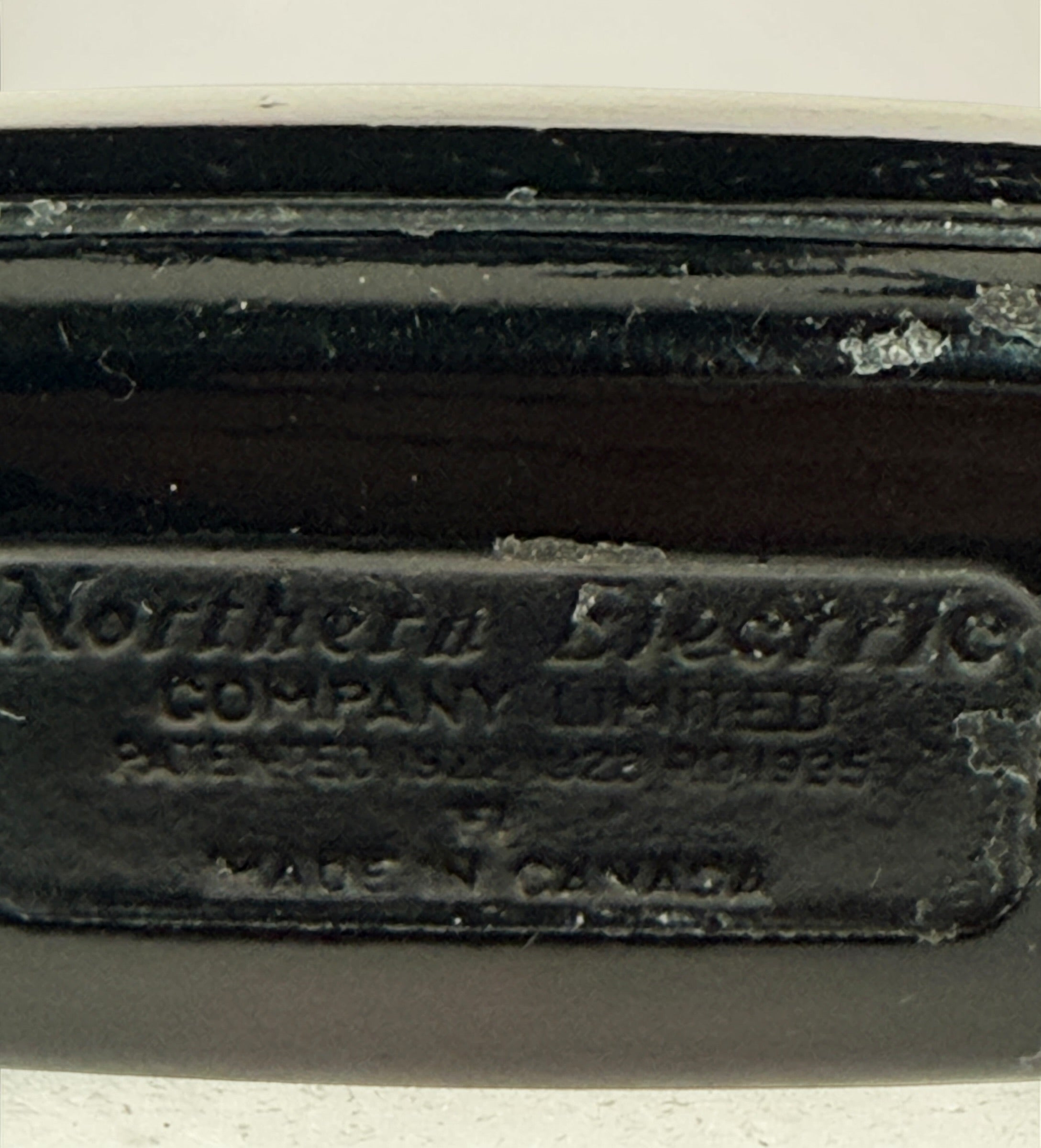 Vintage Northern Electric rotary telephone in black Bakelite, classic Canadian mid-century design. Great display piece or restoration project.