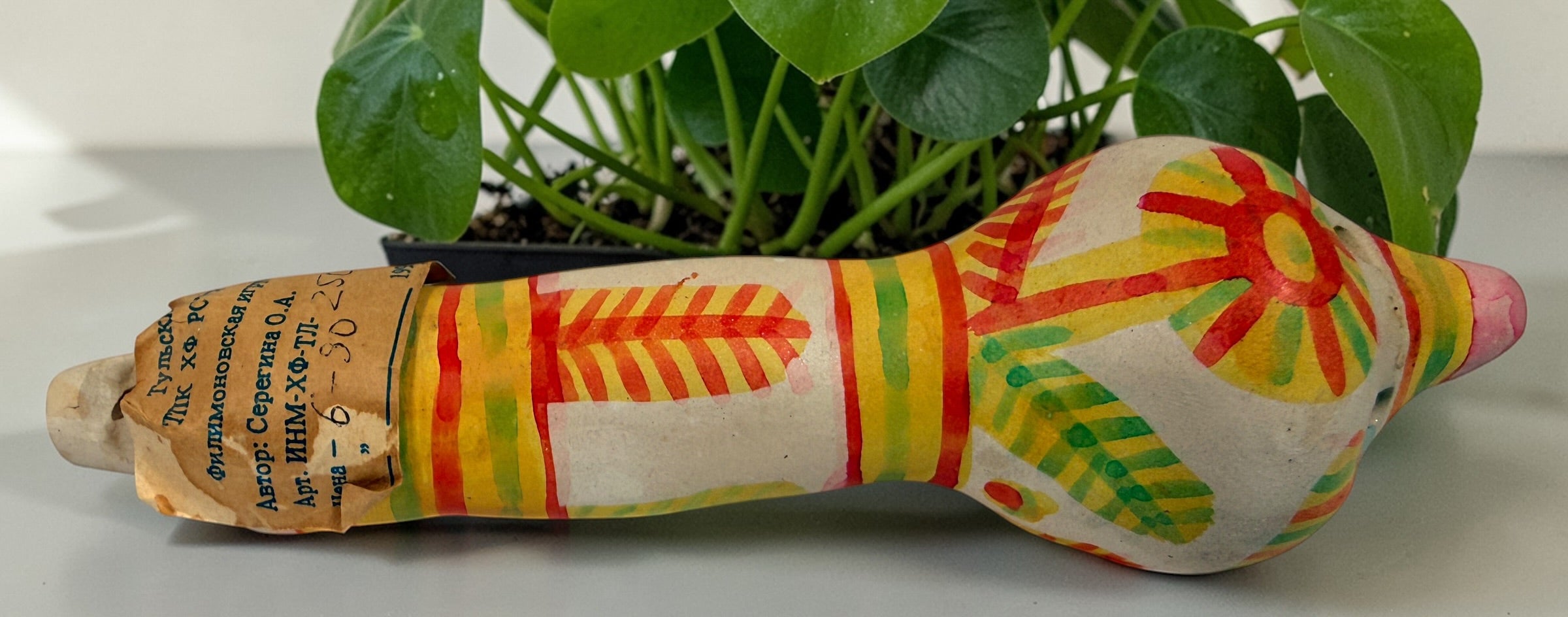 Authentic Filimonovo clay whistle by Seregina O.A. Soviet-era Russian folk art bird figurine with original label, hand-painted collectible pottery.