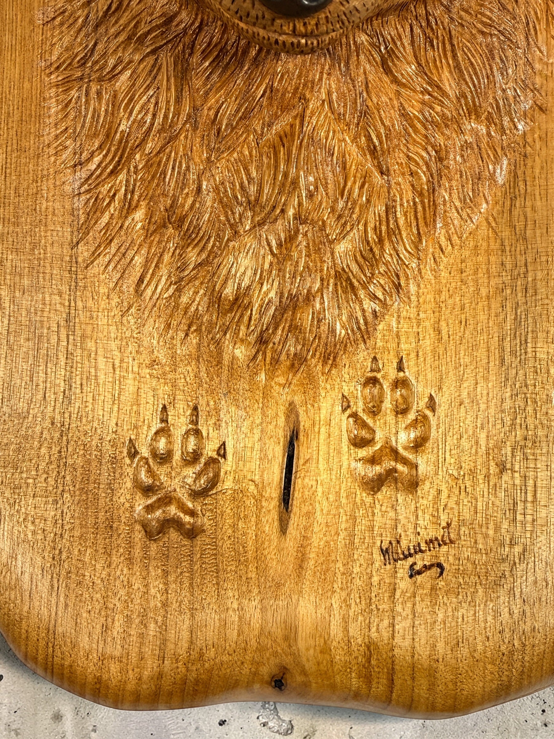 Hand carved raccoon wood wall plaque signed M Ouimet 16 inch rustic Quebec folk art wildlife carving lodge decor live edge wood collectible.