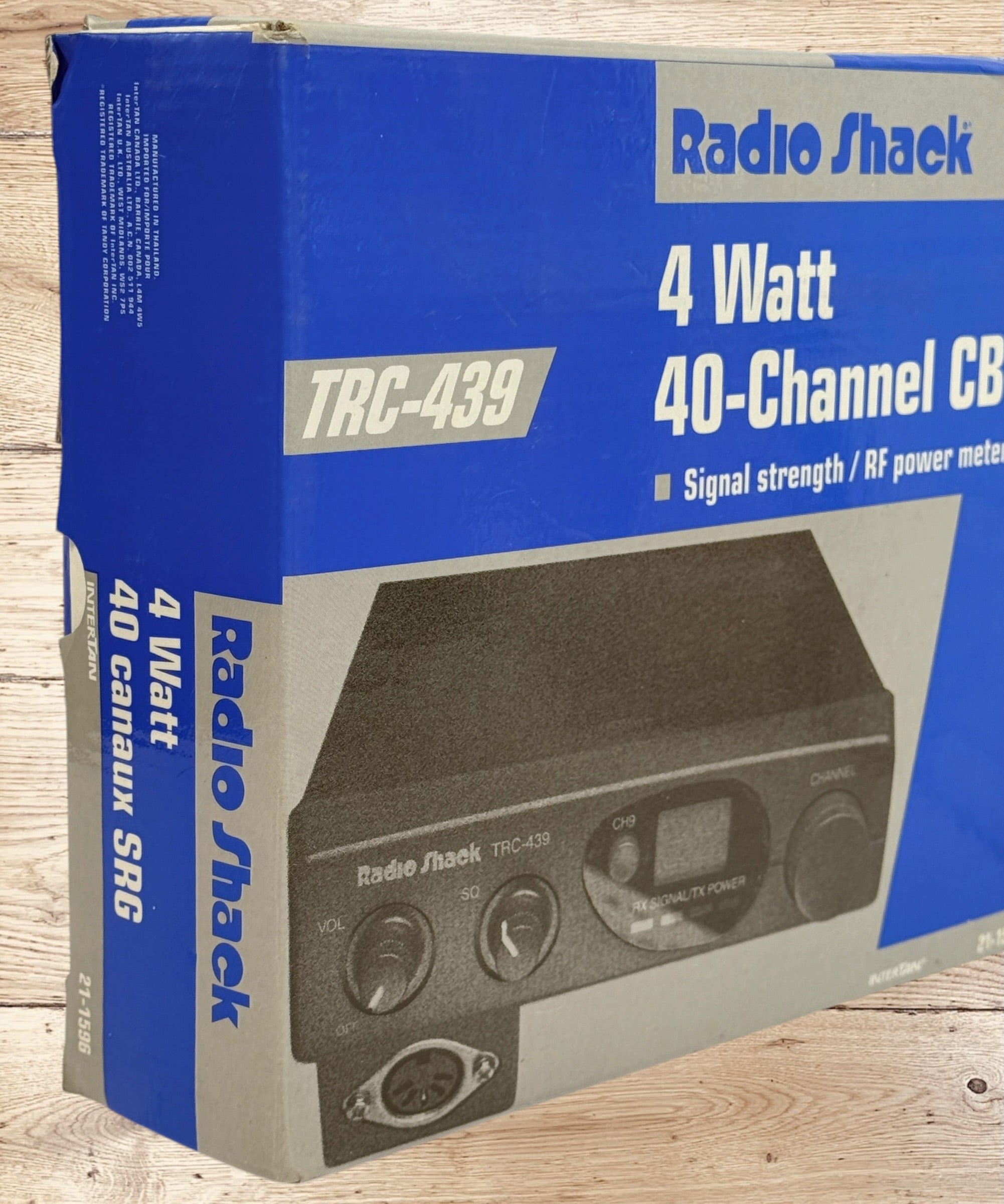 Vintage Radio Shack TRC-439 CB radio with mic and box. 40-channel mobile transceiver, clean condition, ideal for collectors or retro communication setups.