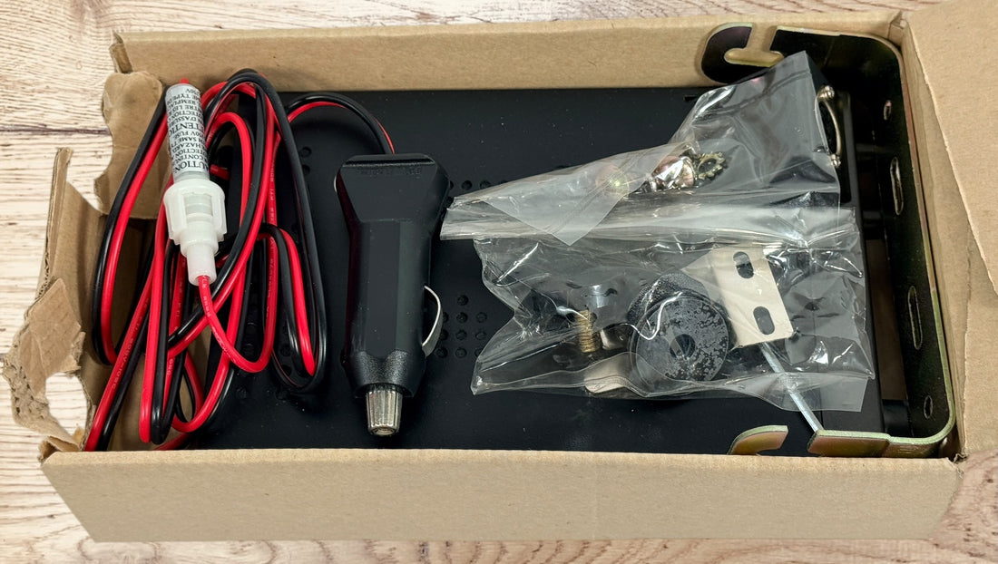 Vintage Radio Shack TRC-439 CB radio with mic and box. 40-channel mobile transceiver, clean condition, ideal for collectors or retro communication setups.