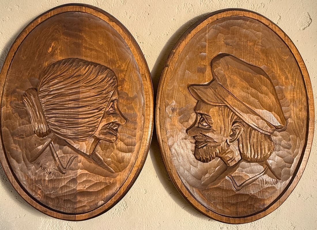 Hand-carved Quebec wood plaques signed Marc Fournier, Saint-Jean-Port-Joli folk art pair featuring fisherman and woman, vintage rustic wall decor.