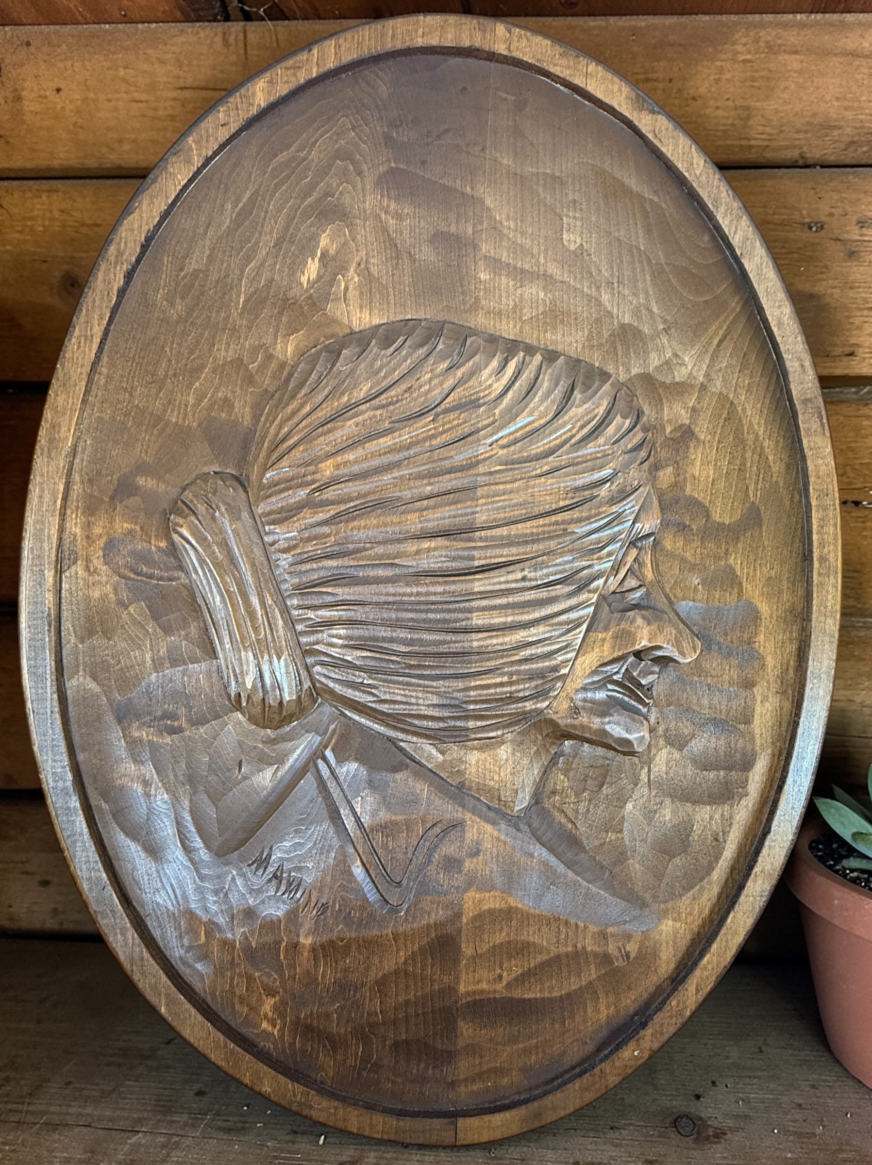 Hand-carved Quebec wood plaques signed Marc Fournier, Saint-Jean-Port-Joli folk art pair featuring fisherman and woman, vintage rustic wall decor.