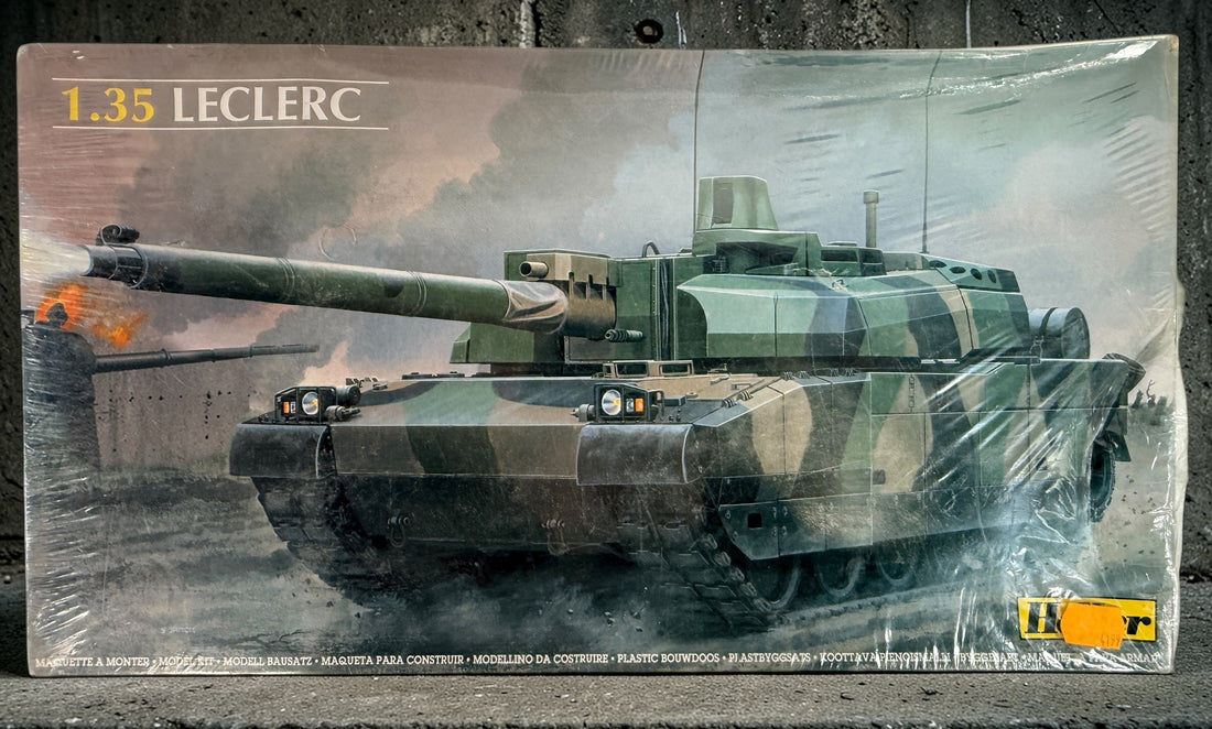 Vintage Heller 1:35 Leclerc tank model kit 81135 made in France. Factory wrap torn with box wear. 225-piece modern military armor kit for collectors.
