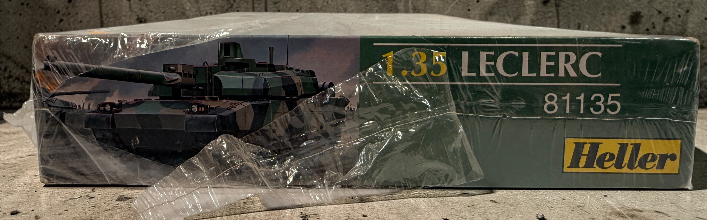 Vintage Heller 1:35 Leclerc tank model kit 81135 made in France. Factory wrap torn with box wear. 225-piece modern military armor kit for collectors.