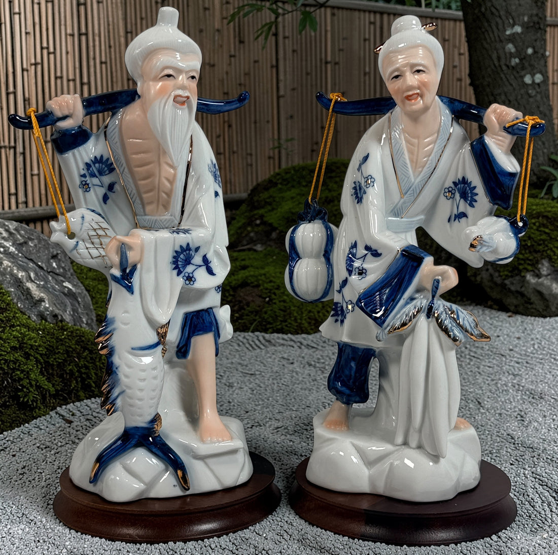 Vintage Japanese porcelain fisherman figurines pair blue white gold mid century export decor collectible Asian style display statues Japan.