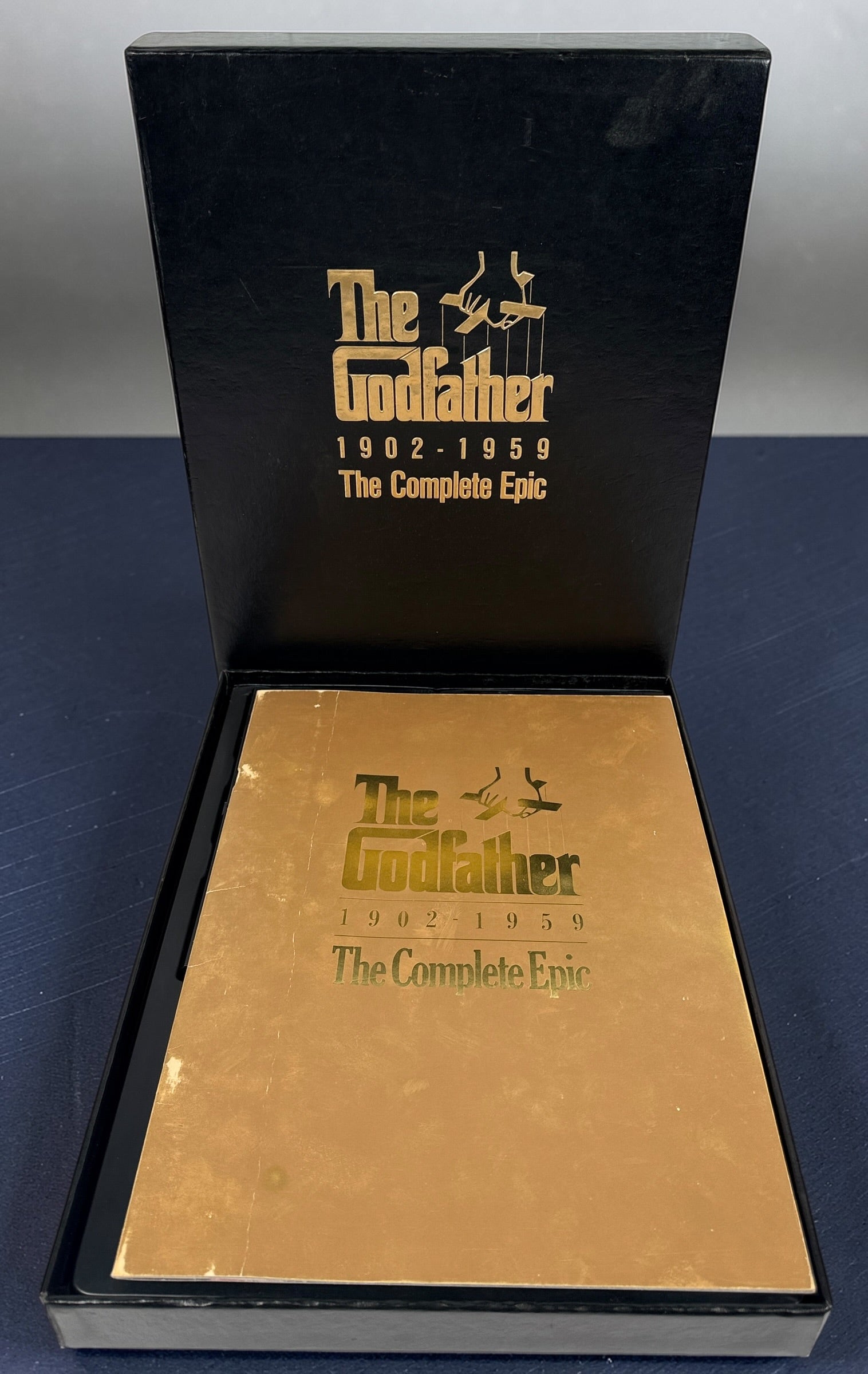 Vintage Godfather Complete Epic VHS box set with 3 tapes and booklet. Chronological edition from Paramount, collectible classic film release.