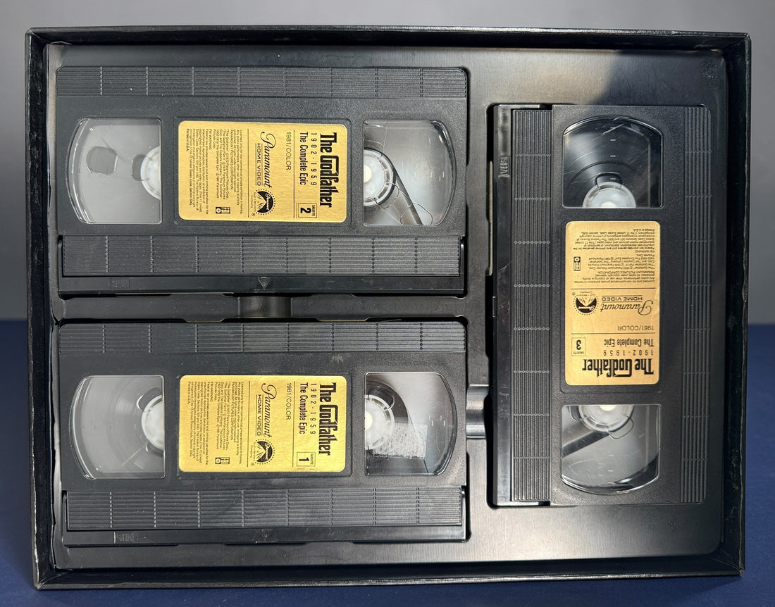 Vintage Godfather Complete Epic VHS box set with 3 tapes and booklet. Chronological edition from Paramount, collectible classic film release.