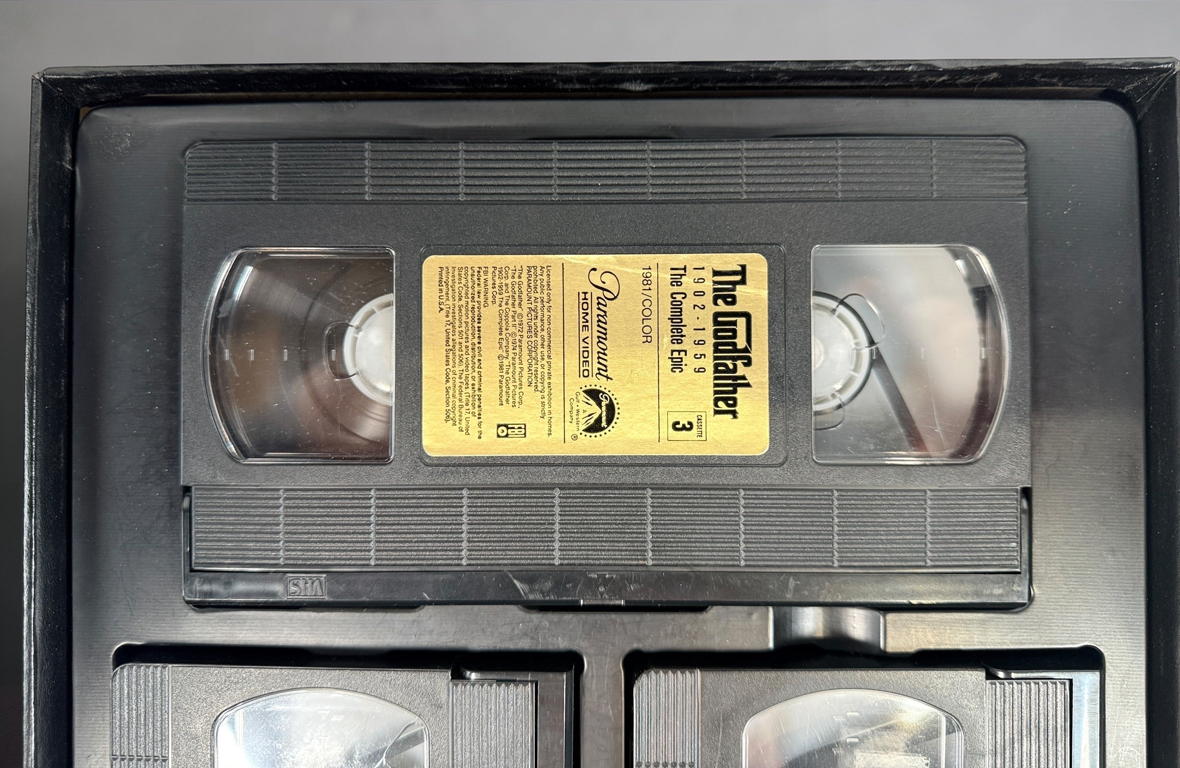 Vintage Godfather Complete Epic VHS box set with 3 tapes and booklet. Chronological edition from Paramount, collectible classic film release.