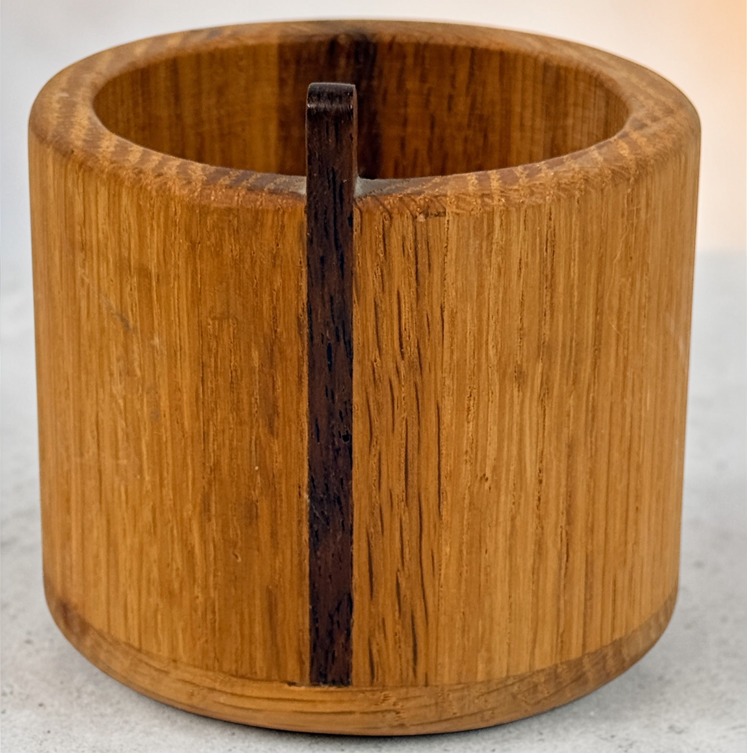 Vintage oak salt cellar with turned wood construction and minimalist design. Functional lidded kitchen container ideal for salt, spices, or countertop storage.