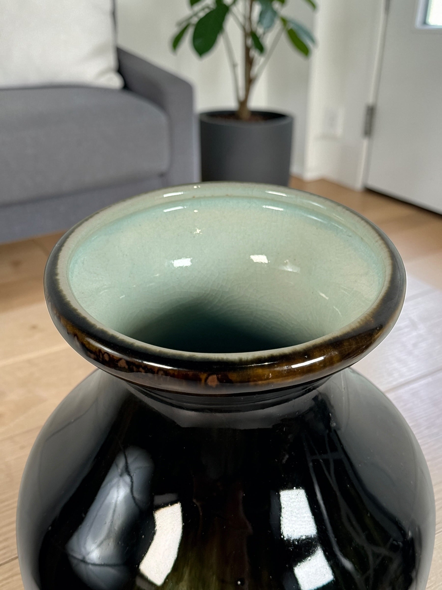Vintage mid century studio pottery vase with bold red, black and green drip glaze. Decorative ceramic statement piece with crackle finish and modern appeal.
