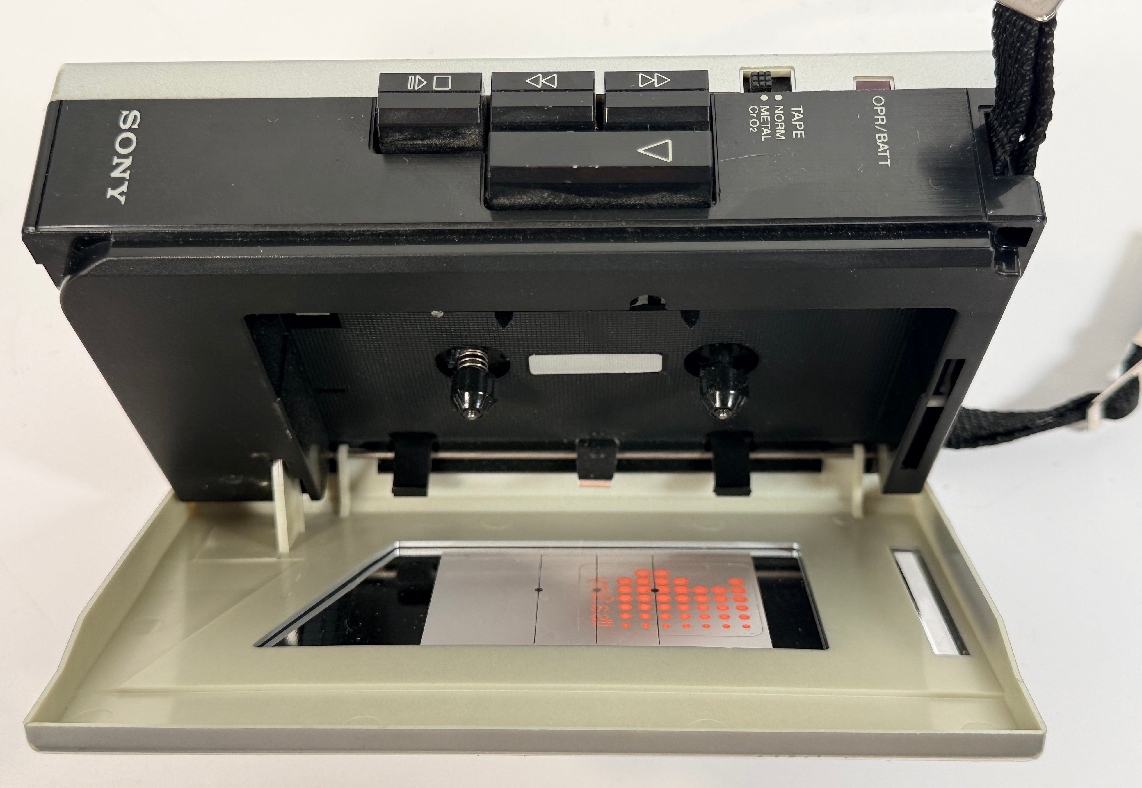Vintage Sony Walkman WM-F12 cassette player with AM/FM radio. Classic 1980s portable audio unit with iconic design, ideal for collectors or restoration.