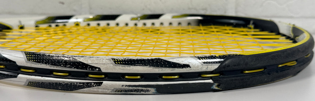 HEAD MicroGel Radical tennis racquet, used player frame with mid-plus head size. Affordable performance racquet with heavy wear, ideal for practice or backup use.