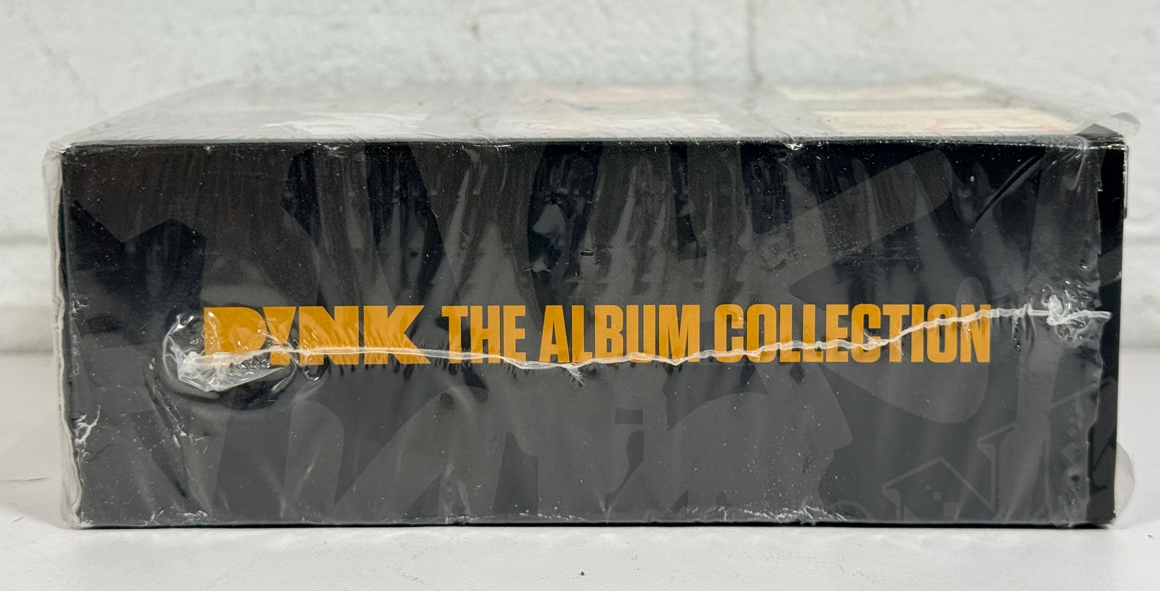 Sealed P!nk Album Collection 5 CD box set with five classic albums. Minor wrap damage. Complete pop discography set from Sony Music. Great value.