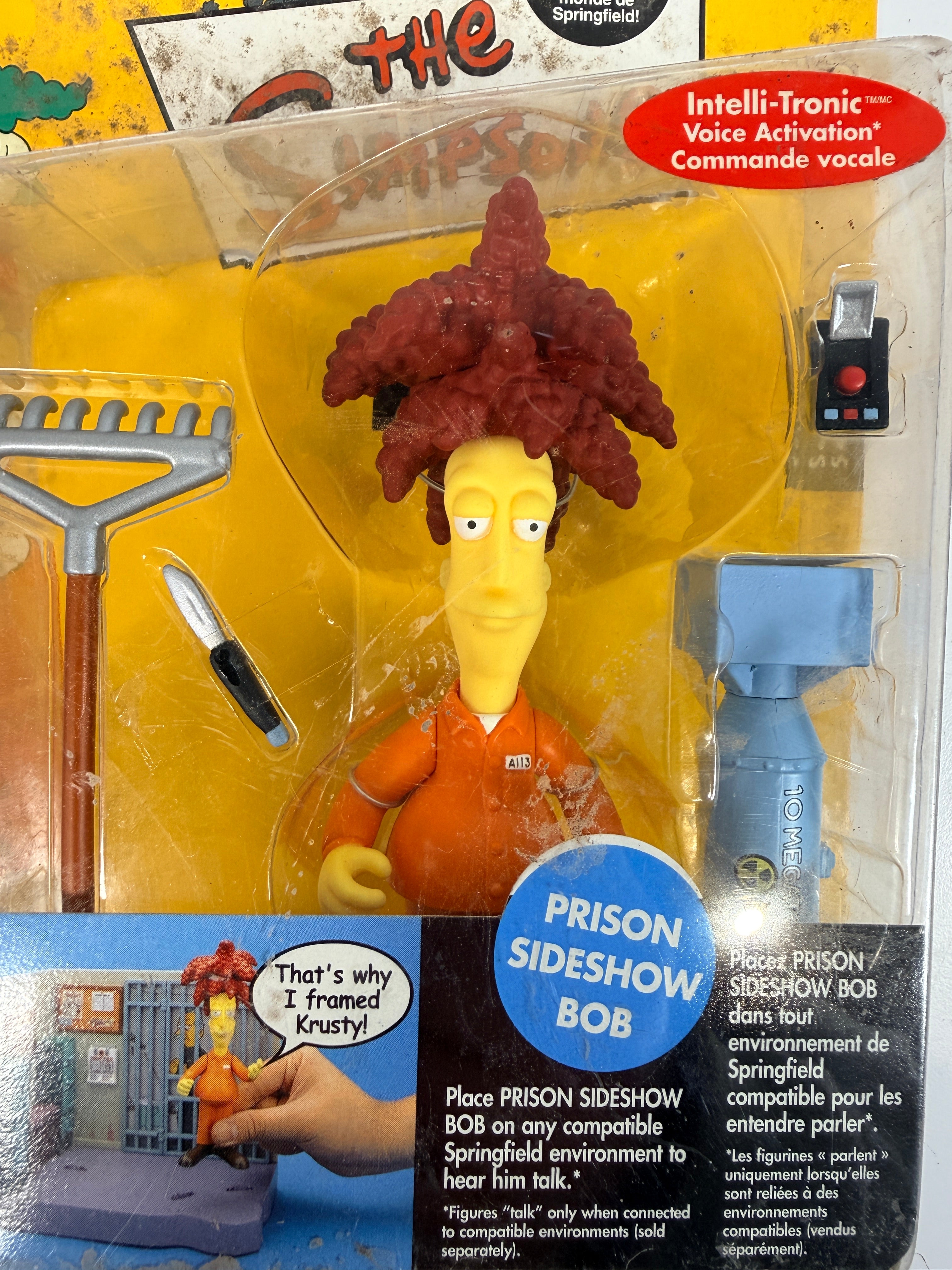 The Simpsons Prison Sideshow Bob sealed Playmates World of Springfield figure with accessories. Vintage collectible action figure carded toy.
