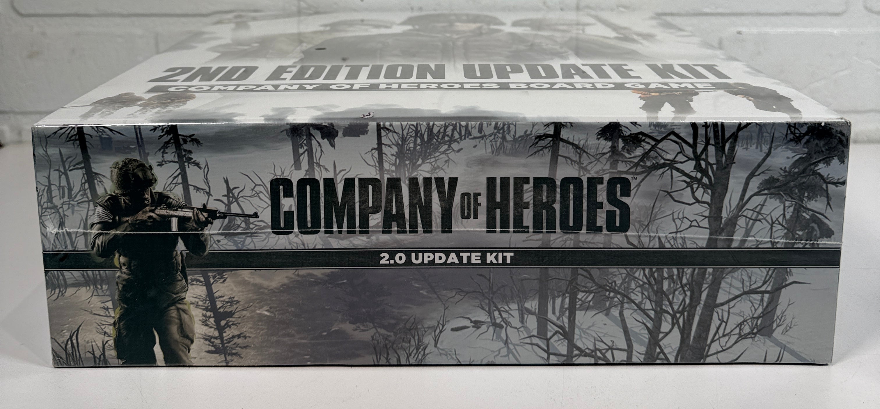 Company of Heroes 2nd Edition Update Kit board game expansion. Includes updated maps, cards, dice and components. Requires original game to play.