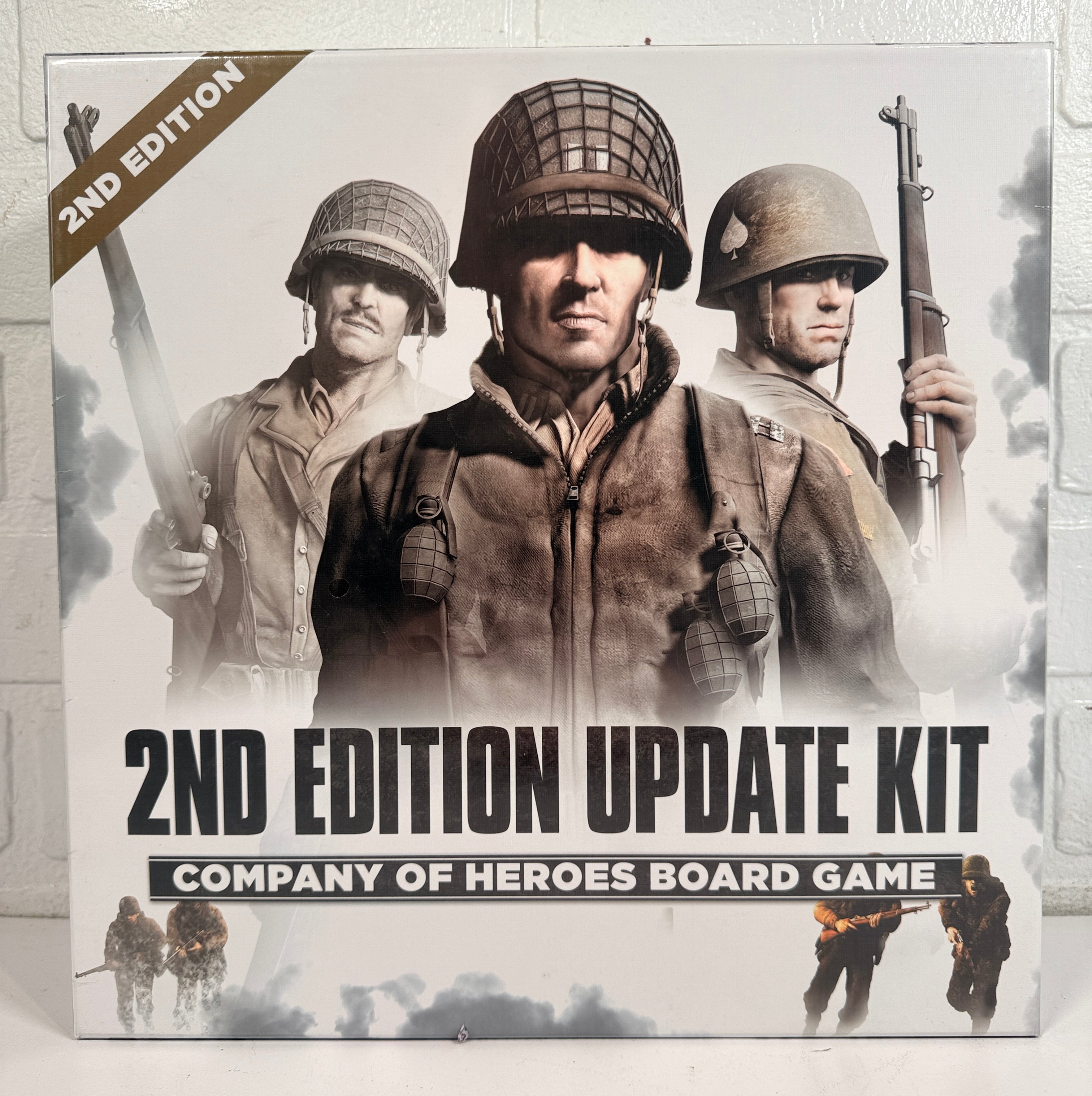 Company of Heroes 2nd Edition Update Kit board game expansion. Includes updated maps, cards, dice and components. Requires original game to play.