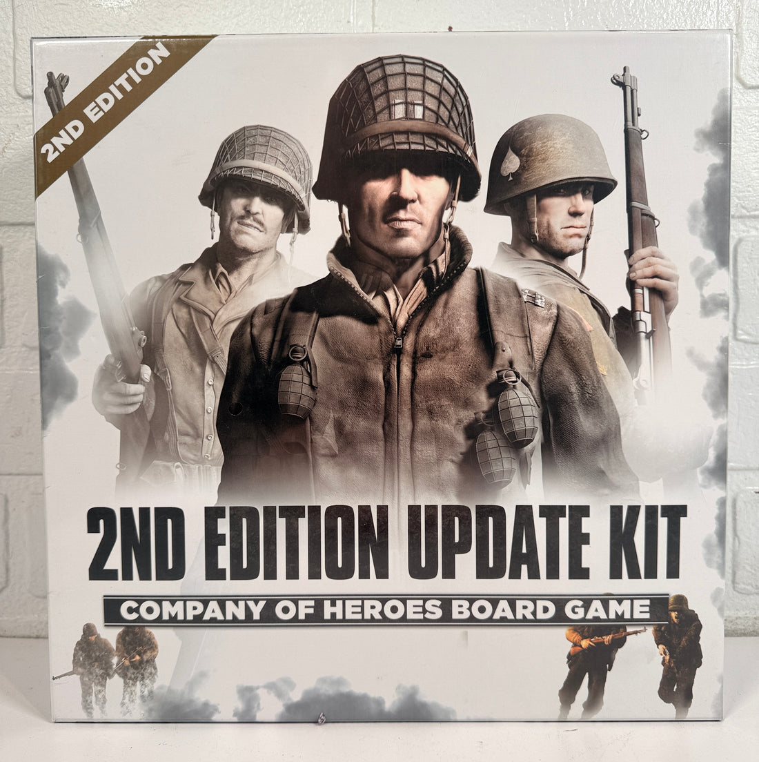 Company of Heroes 2nd Edition Update Kit board game expansion. Includes updated maps, cards, dice and components. Requires original game to play.