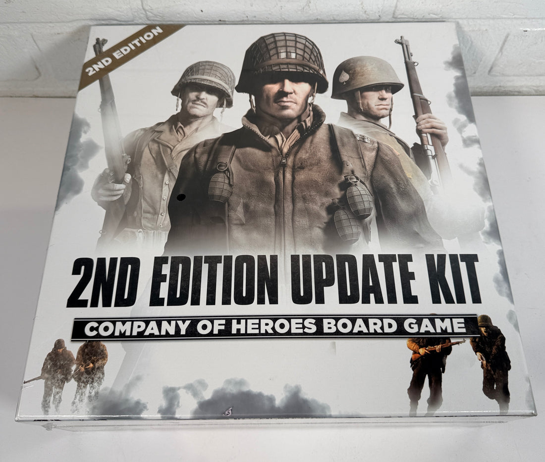 Company of Heroes 2nd Edition Update Kit board game expansion. Includes updated maps, cards, dice and components. Requires original game to play.