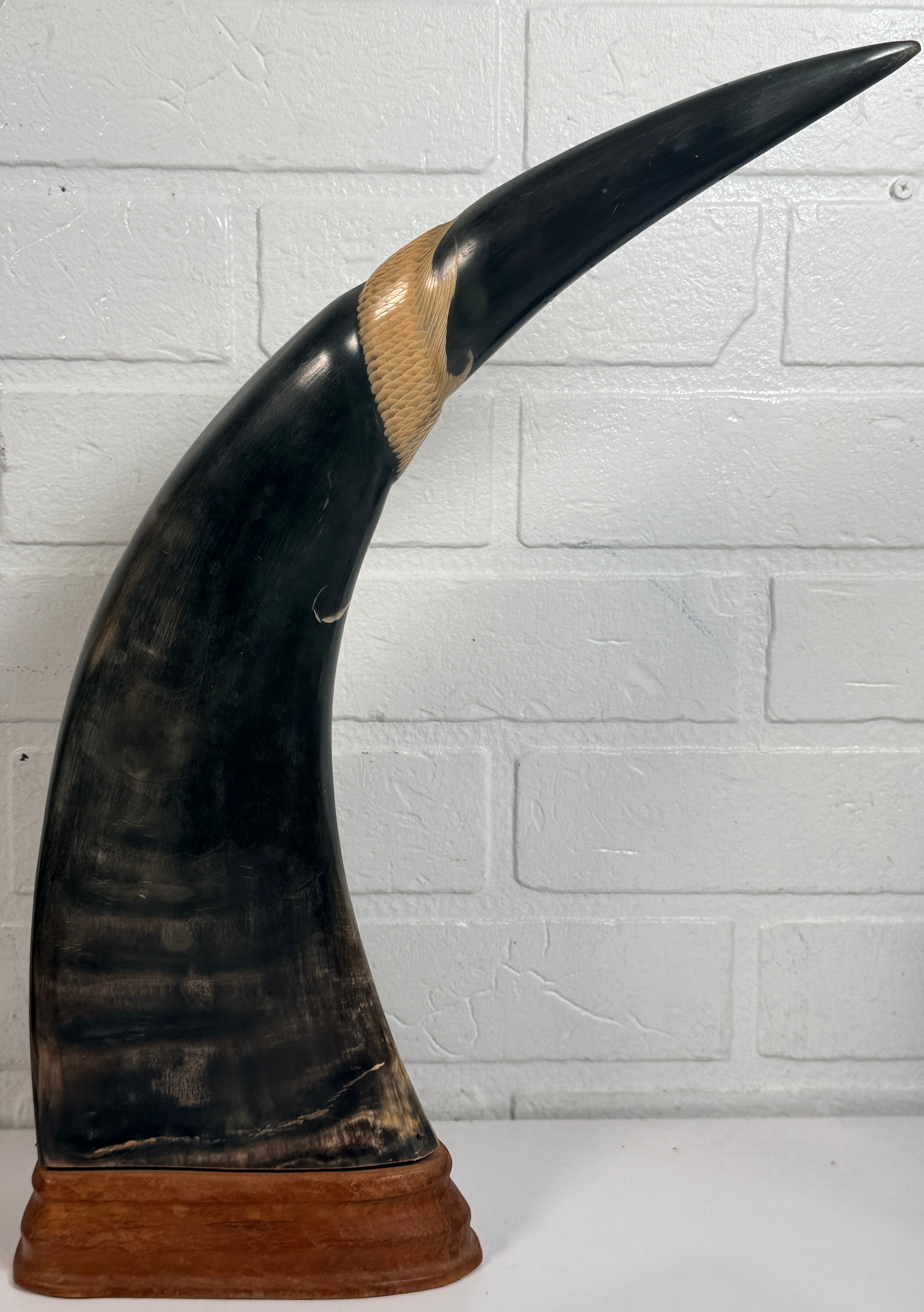 Vintage pair buffalo horn dragon phoenix statues on hardwood bases. Hand carved Asian décor sculptures with dramatic natural horn shape and collectible appeal.