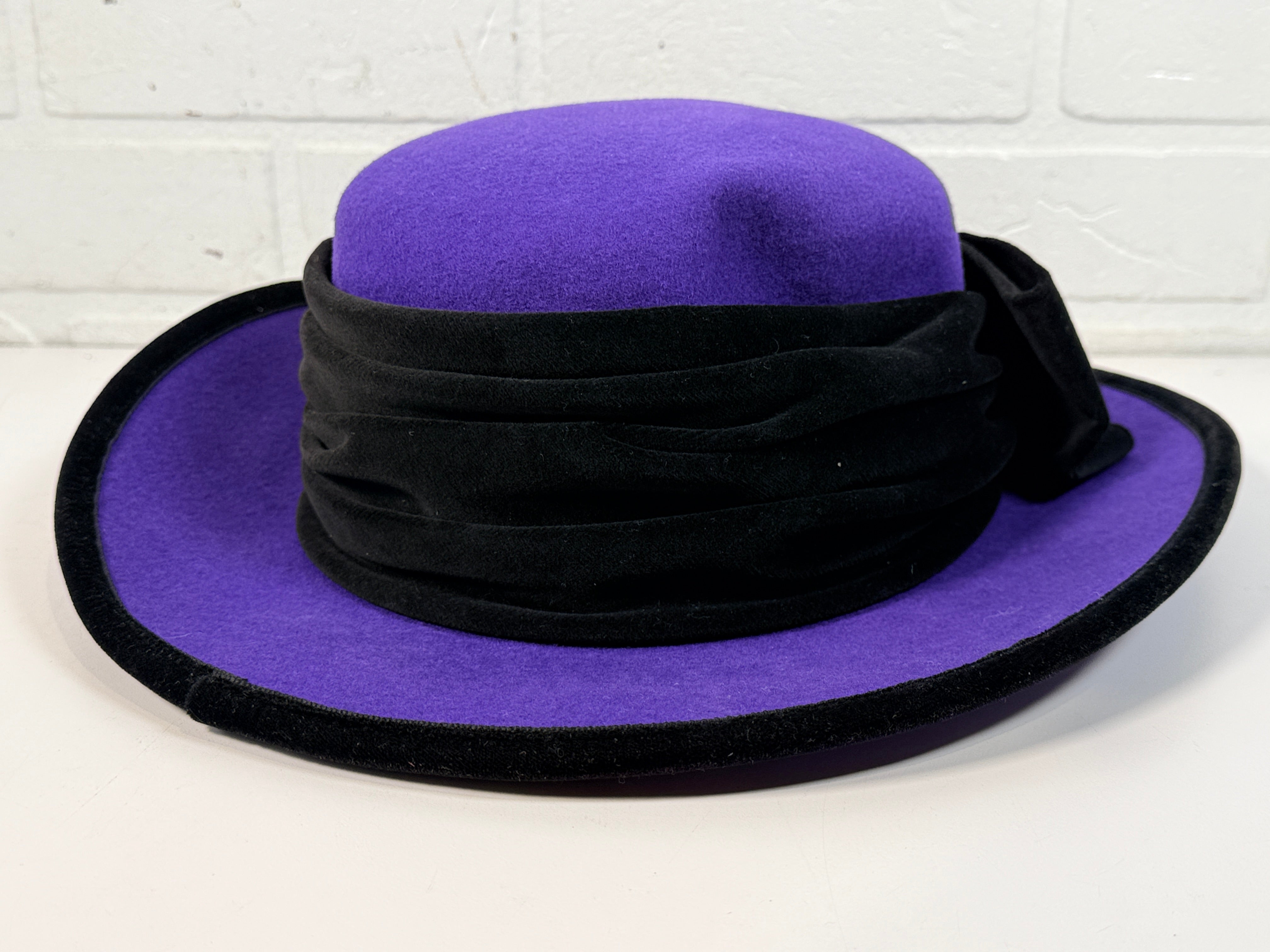 Vintage Alexon purple wool felt hat made in England with black velvet trim and bow. Elegant statement wide brim ladies formal occasion hat.