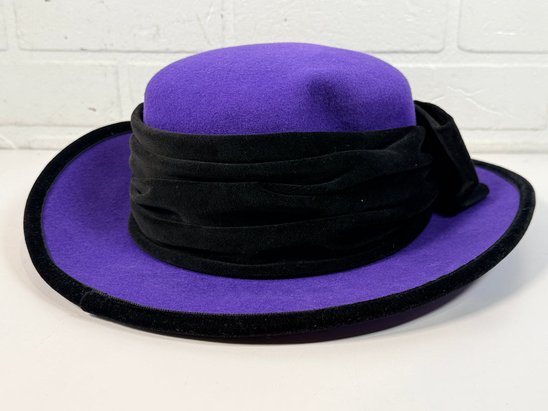 Vintage Alexon purple wool felt hat made in England with black velvet trim and bow. Elegant statement wide brim ladies formal occasion hat.