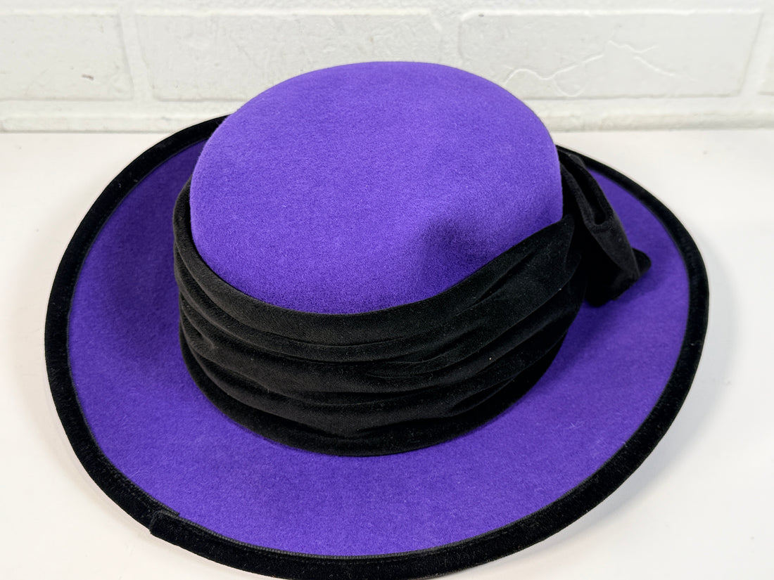 Vintage Alexon purple wool felt hat made in England with black velvet trim and bow. Elegant statement wide brim ladies formal occasion hat.