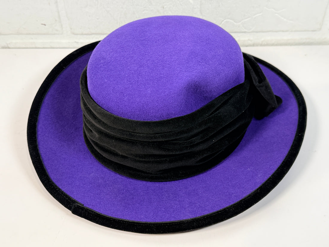 Vintage Alexon purple wool felt hat made in England with black velvet trim and bow. Elegant statement wide brim ladies formal occasion hat.