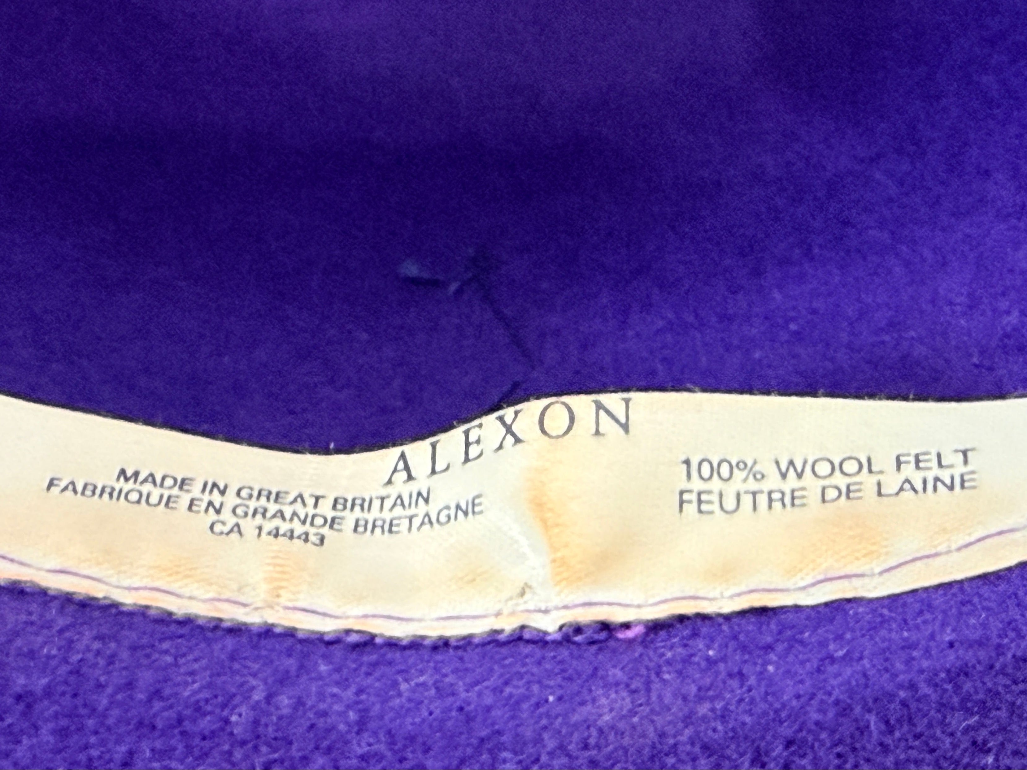 Vintage Alexon purple wool felt hat made in England with black velvet trim and bow. Elegant statement wide brim ladies formal occasion hat.