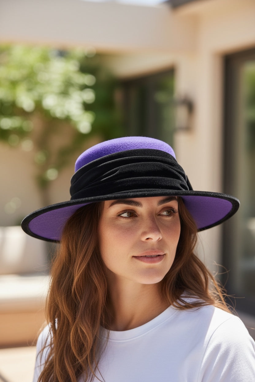 Vintage Alexon purple wool felt hat made in England with black velvet trim and bow. Elegant statement wide brim ladies formal occasion hat.