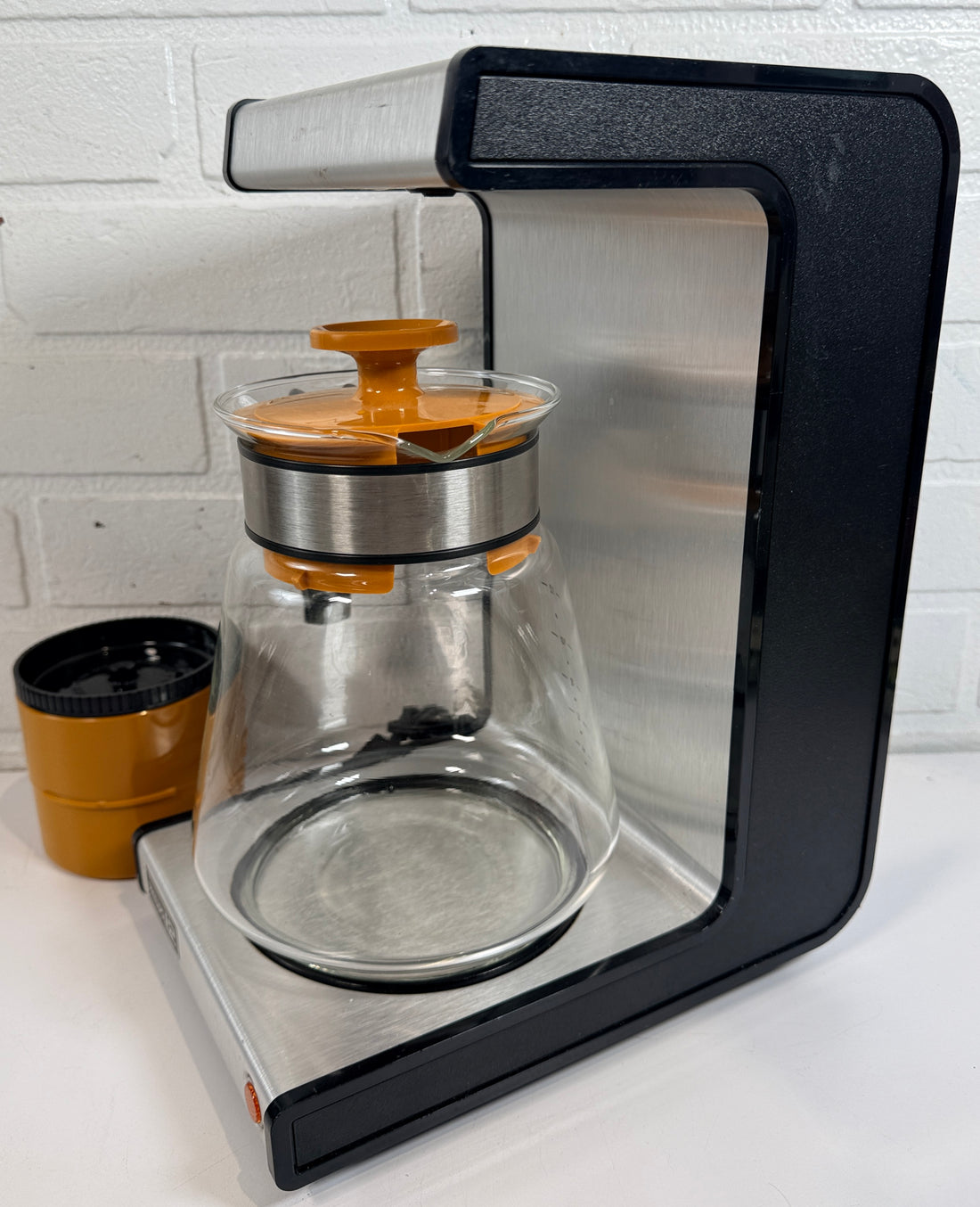  Vintage Philips 12 orange coffee maker with original carafe. Retro 1970s Dutch drip brewer in iconic industrial design styling
