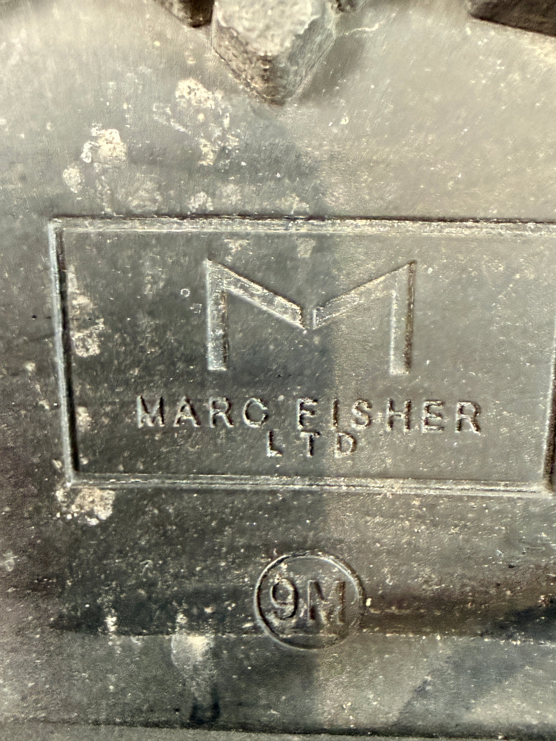 Marc Fisher shearling lined black leather hiking boots size 9M. Rugged winter lace-up ankle boots with lug soles and warm lining, pre-owned condition.