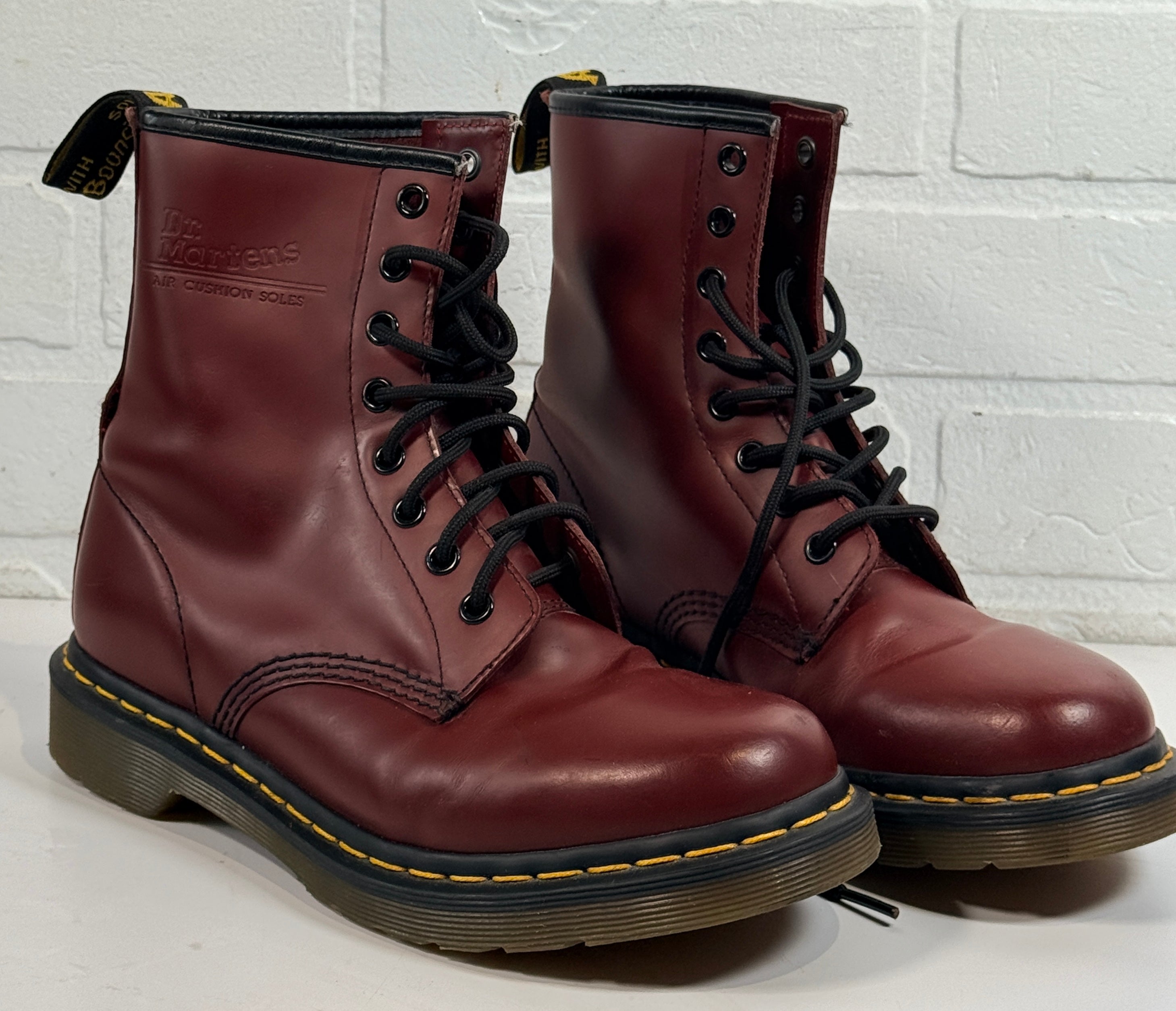 Dr. Martens cherry red 8 eye leather boots womens US 8 UK 6 classic 1460 style air cushioned sole preowned in very good condition.