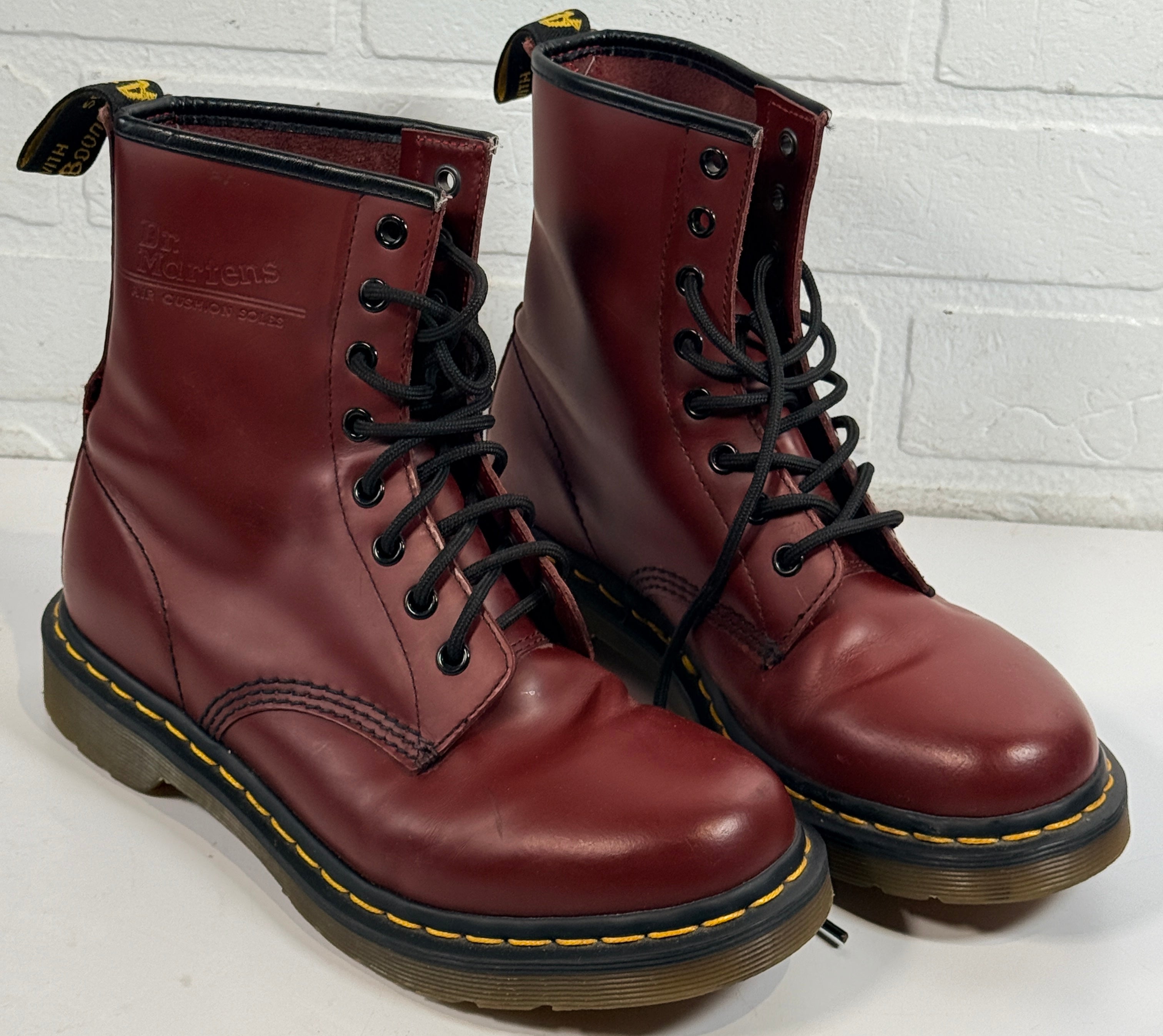 Dr. Martens cherry red 8 eye leather boots womens US 8 UK 6 classic 1460 style air cushioned sole preowned in very good condition.