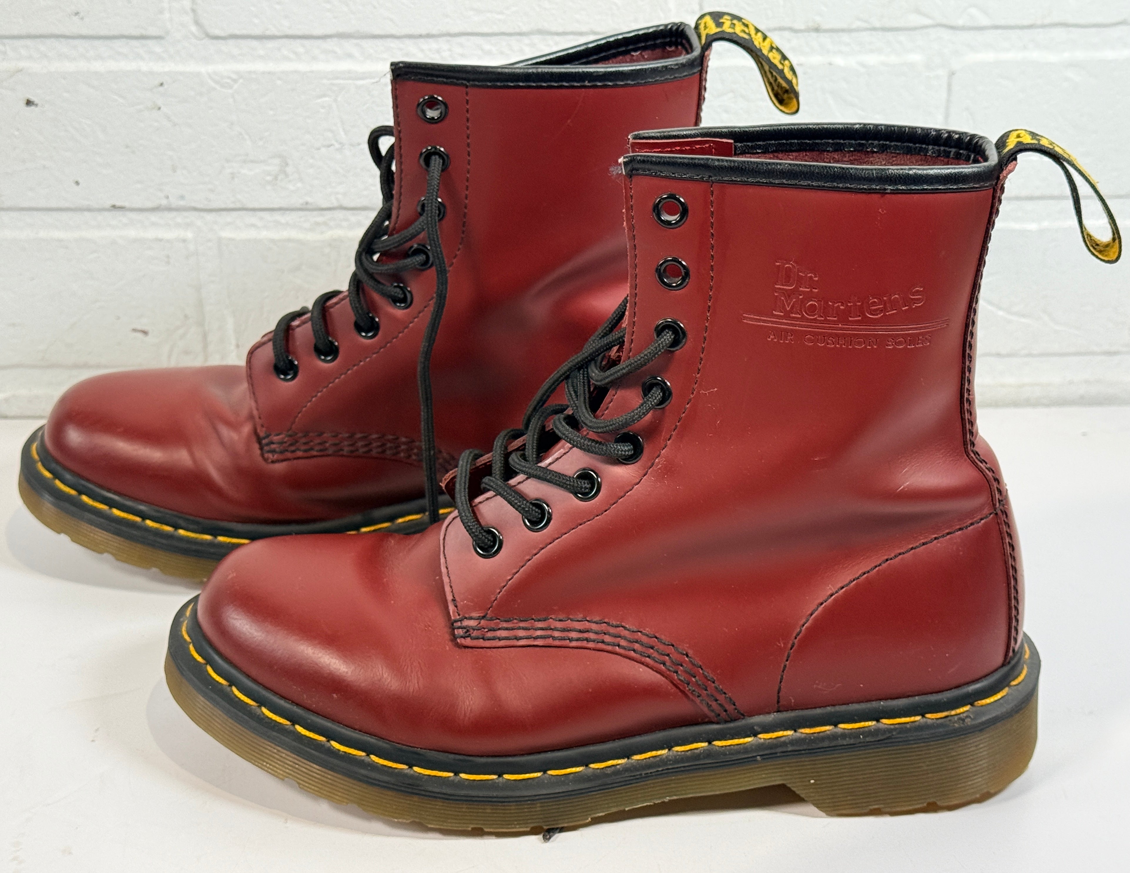 Dr. Martens cherry red 8 eye leather boots womens US 8 UK 6 classic 1460 style air cushioned sole preowned in very good condition.
