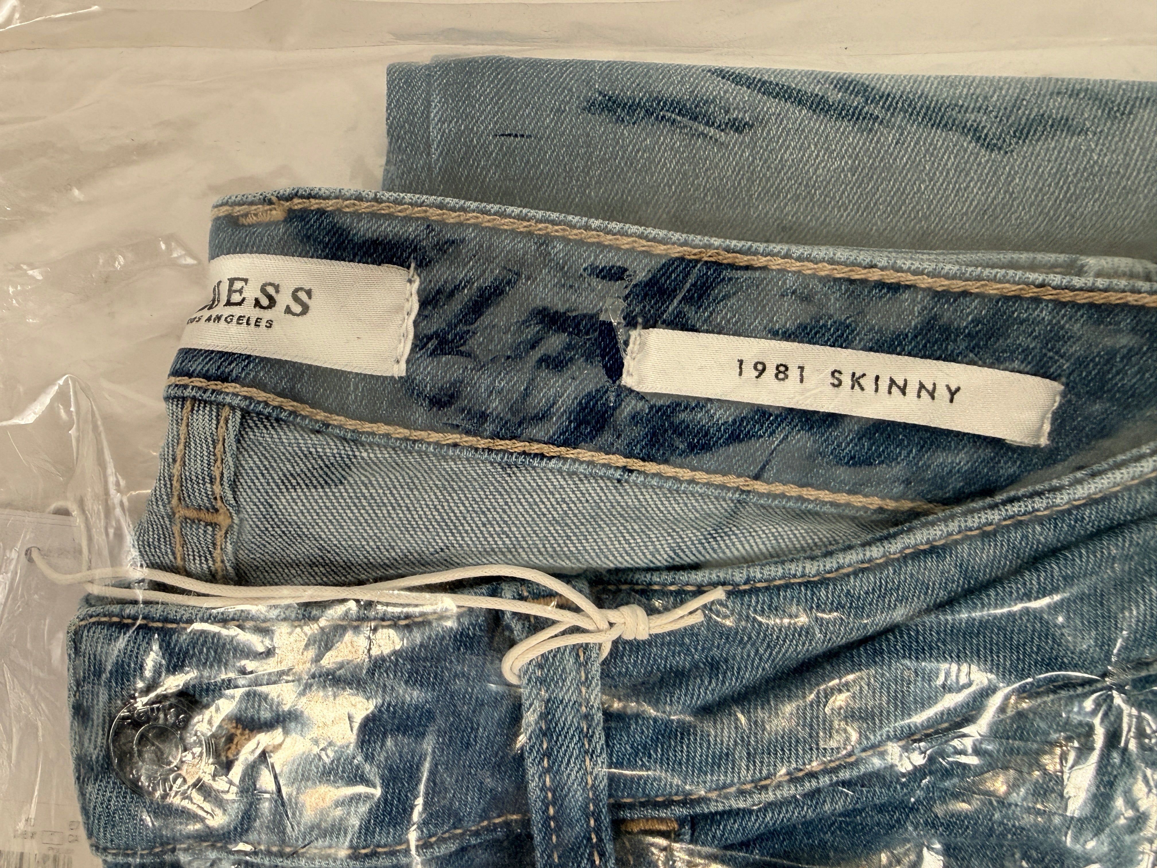 GUESS 1981 Skinny Jeans size 29 in Sky Blue Wash. New sealed with tags, authentic GUESS denim, classic stretch skinny fit, below retail pricing.