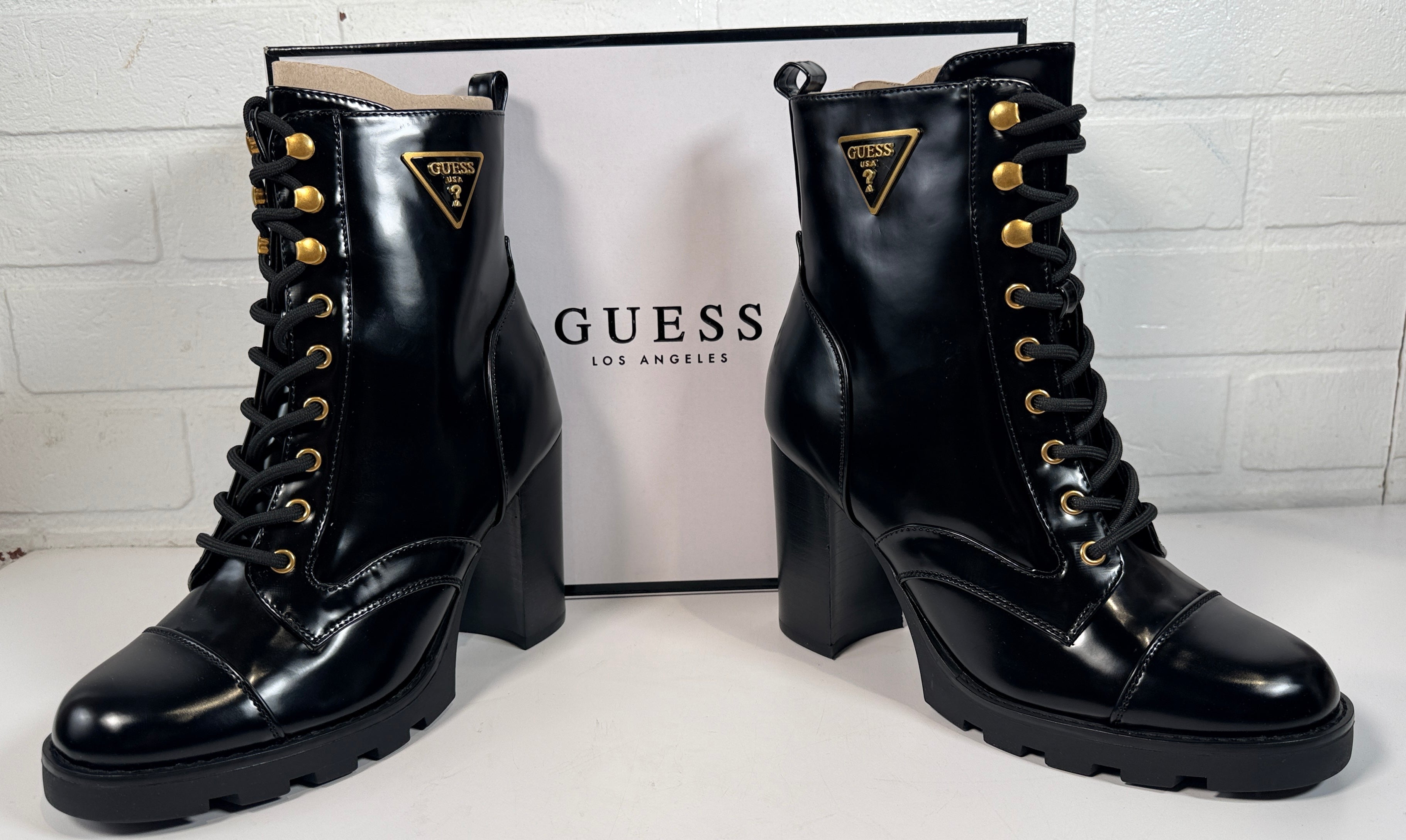 GUESS Gwneadyn black combat heel boots size 8 new in box. Lace-up ankle boots with block heel, lug sole and side zip designer style.