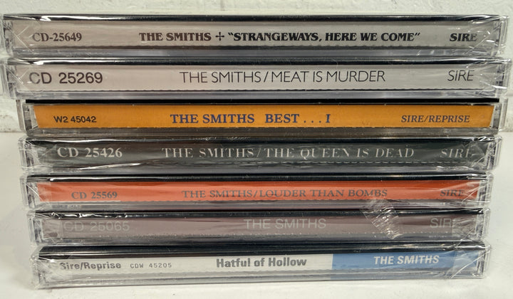 The Smiths 7 CD lot with Queen Is Dead, Hatful of Hollow, Meat Is Murder, Strangeways and more. Great collector bundle.