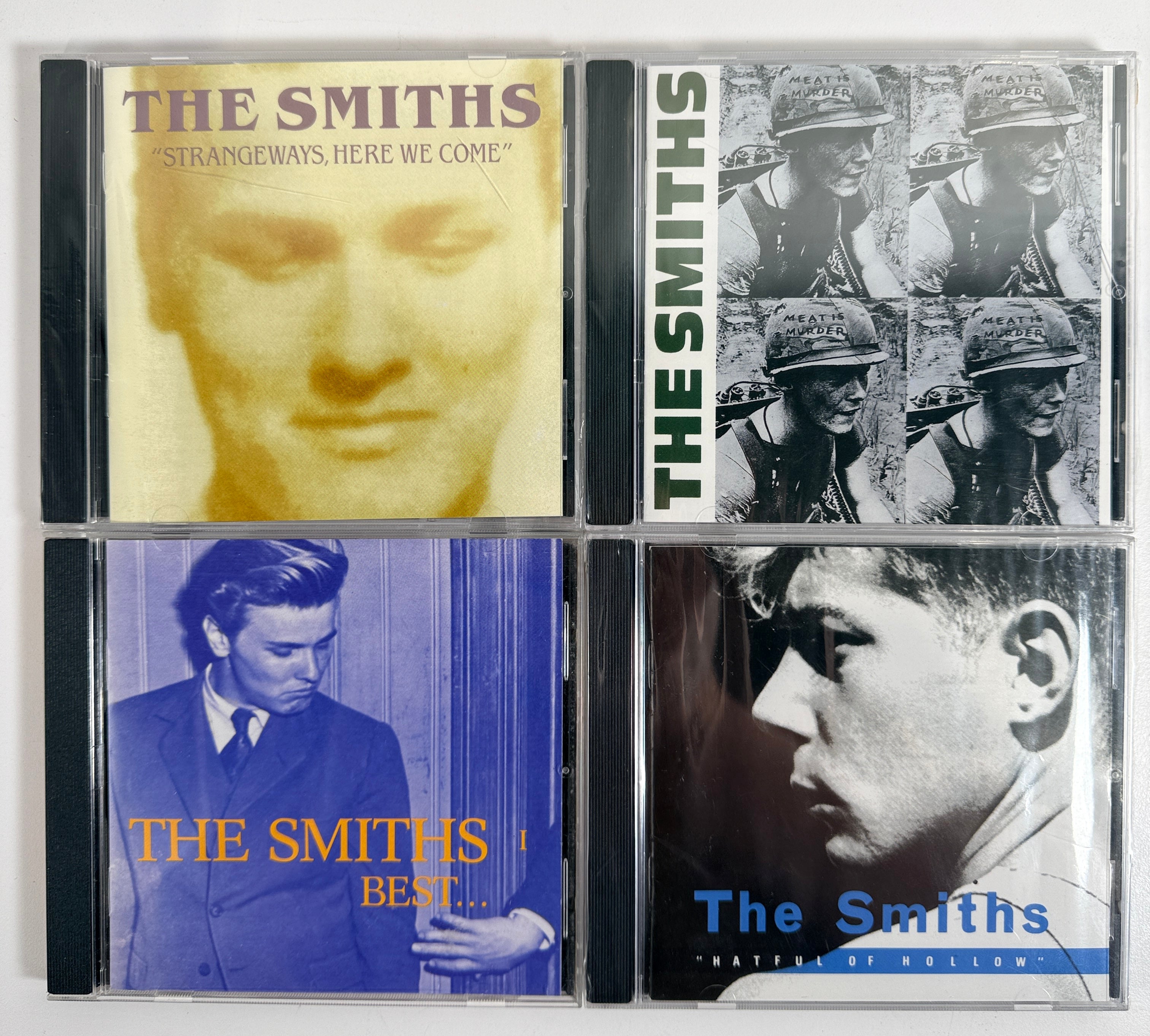 The Smiths 7 CD lot with Queen Is Dead, Hatful of Hollow, Meat Is Murder, Strangeways and more. Great collector bundle.