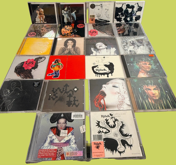 Björk CD collection lot with rare singles, imports, live releases and albums including Debut, Volta, Vespertine and Greatest Hits. Collector bundle