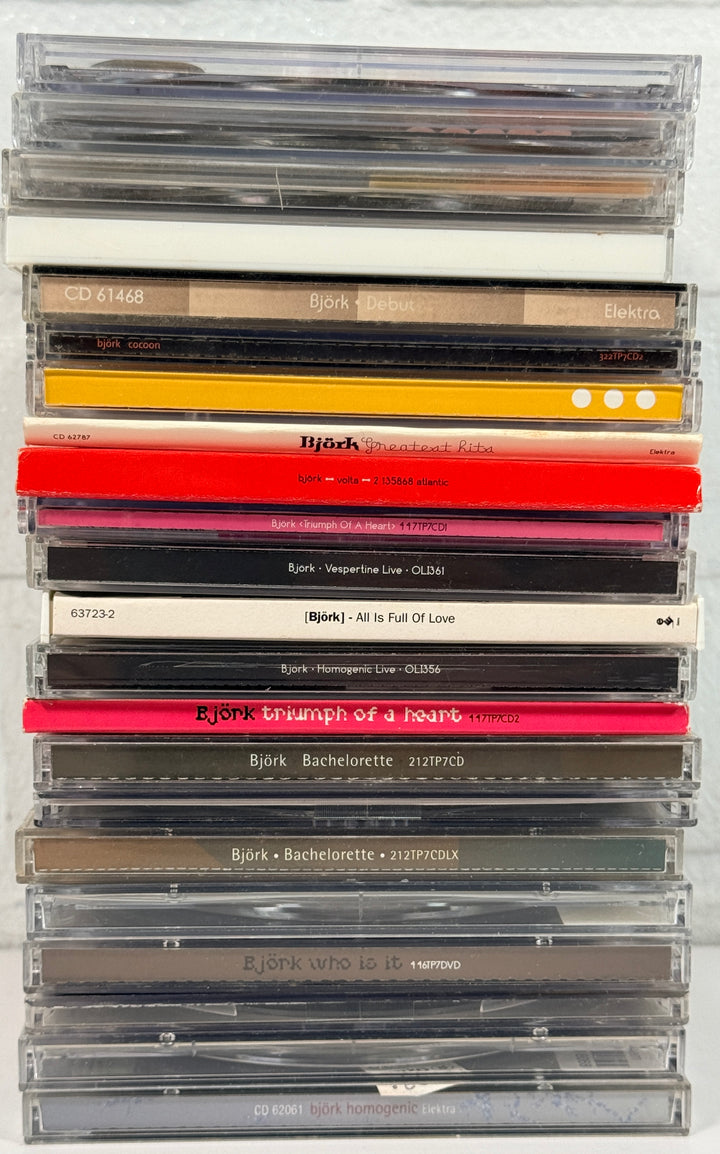 Björk CD collection lot with rare singles, imports, live releases and albums including Debut, Volta, Vespertine and Greatest Hits. Collector bundle