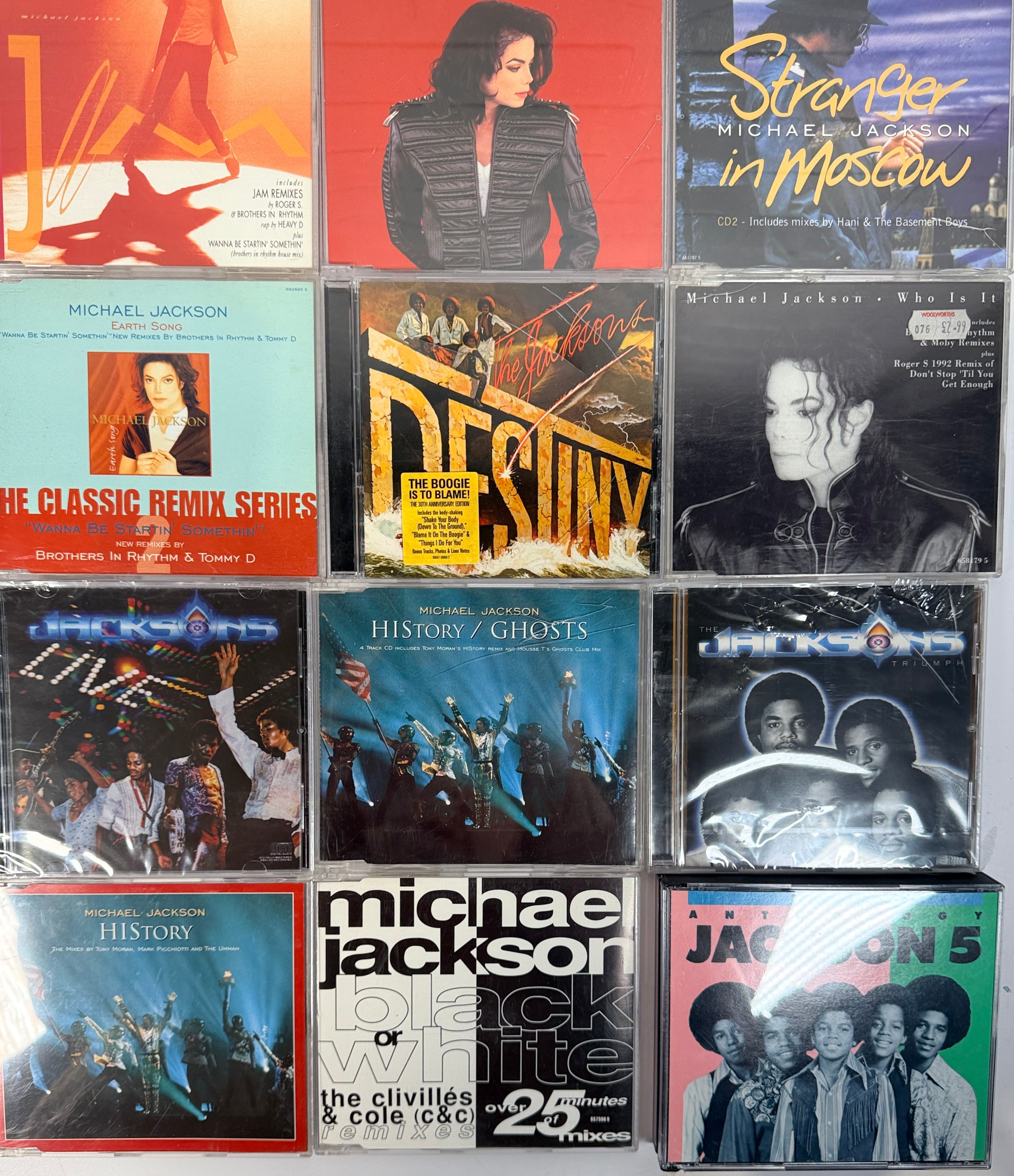 Michael Jackson CD lot with albums, singles, Jacksons and Jackson 5 titles. Collector bundle featuring HIStory, Blood On The Dance Floor and more.